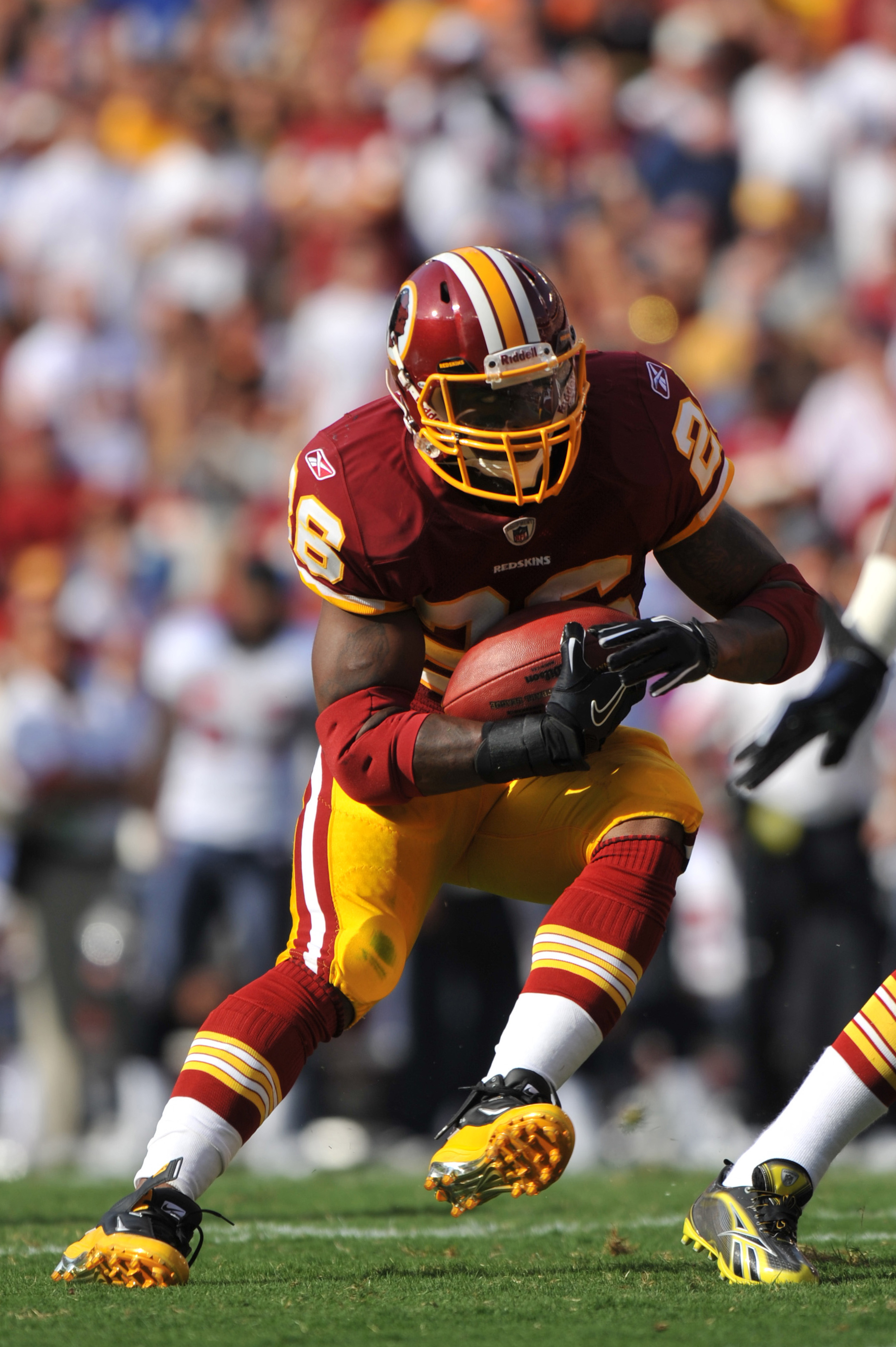 Sep 26, 2010 - St Louis, Missouri, U.S. - Washington running back CLINTON  PORTIS (26) carries the ball in the game between the St. Louis Rams and the  Washington Redskins at the