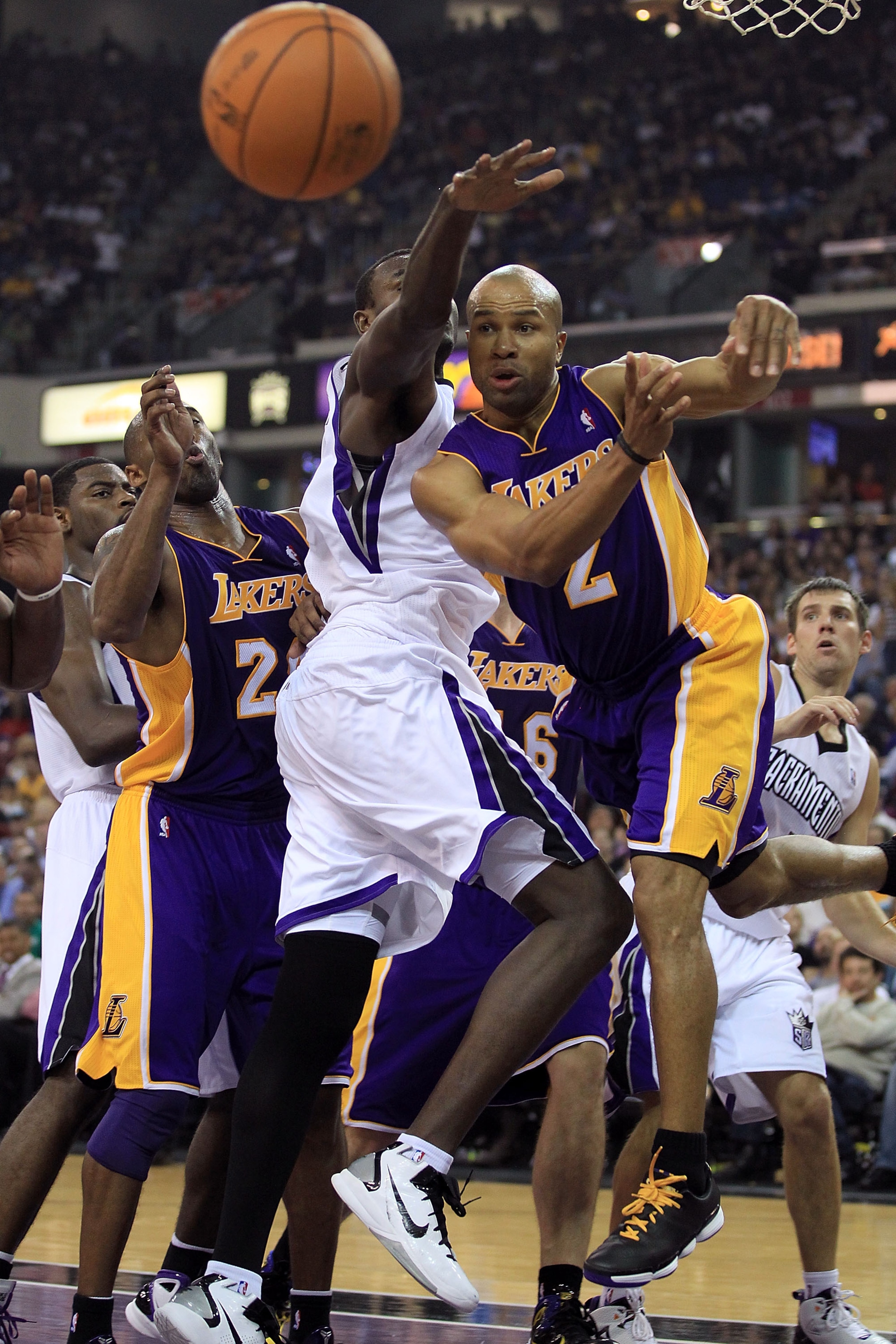 SACRAMENTO, CA - NOVEMBER 03: Derek Fisher #2 of the Los Angeles Lakers passes the ball during their game against the Sacramento Kings at ARCO Arena on November 3, 2010 in Sacramento, California. NOTE TO USER: User expressly acknowledges and agrees that, SACRAMENTO, CA - NOVEMBER 03: Derek Fisher #2 of the Los Angeles Lakers passes the ball during their game against the Sacramento Kings at ARCO Arena on November 3, 2010 in Sacramento, California. NOTE TO USER: User expressly acknowledges and agrees that,