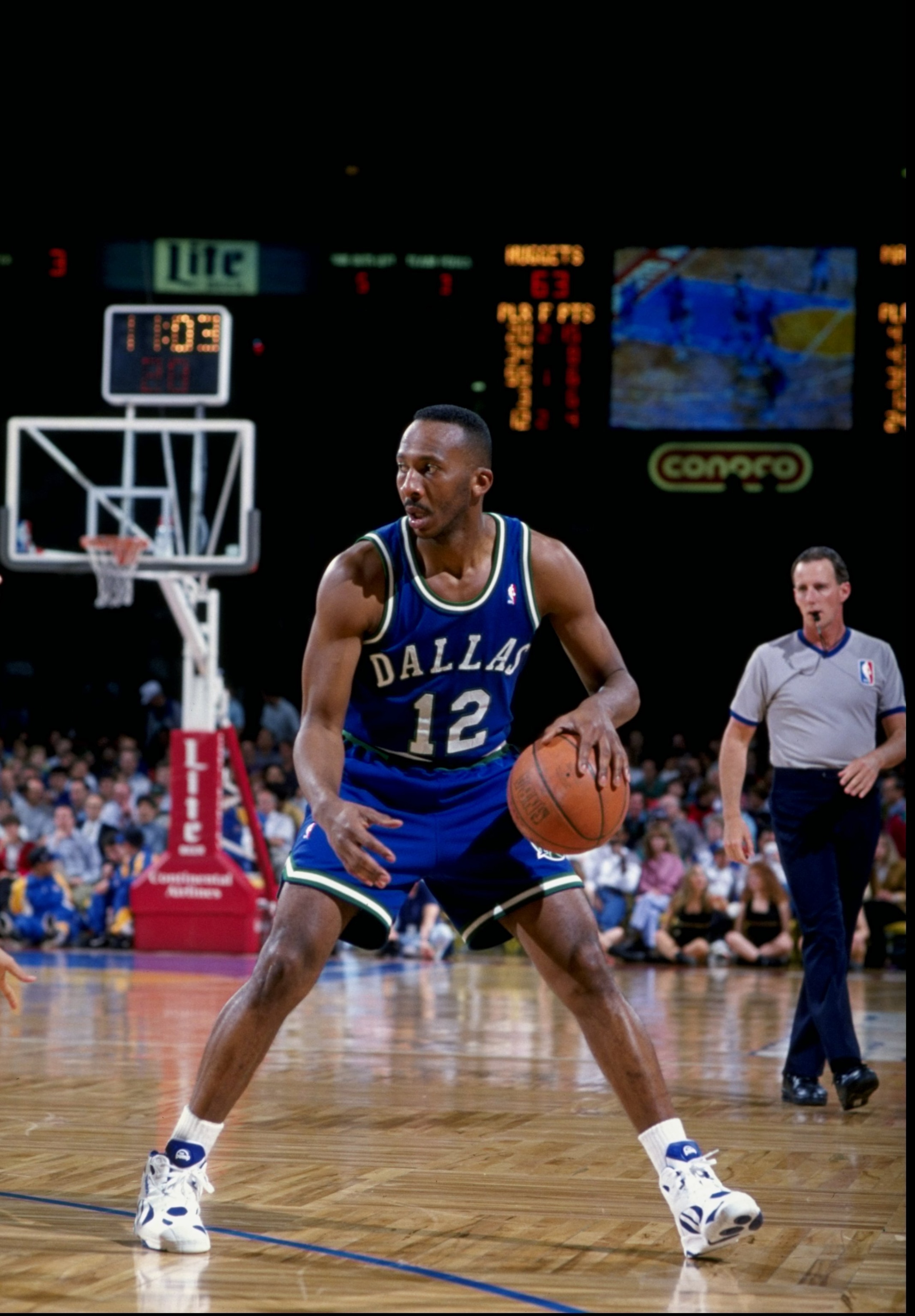 Guard Derek Harper of the Dallas Mavericks in action during a game against the Denver Nuggets at the McNichols Sports Arena in Denver, Colorado. Guard Derek Harper of the Dallas Mavericks in action during a game against the Denver Nuggets at the McNichols Sports Arena in Denver, Colorado.