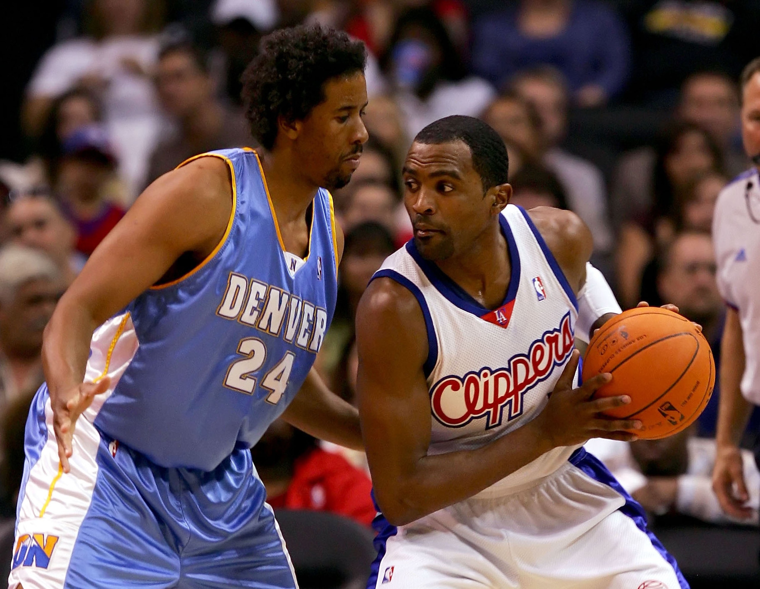 LOS ANGELES - OCTOBER 27: Andre Miller #24 of the Denver Nuggets puts the pressure on Cuttino Mobley #5 of the Los Angeles Clippers on October 27, 2006 at Staples Center in Los Angeles, California. NOTE TO USER: User expressly acknowledges and agrees th LOS ANGELES - OCTOBER 27: Andre Miller #24 of the Denver Nuggets puts the pressure on Cuttino Mobley #5 of the Los Angeles Clippers on October 27, 2006 at Staples Center in Los Angeles, California. NOTE TO USER: User expressly acknowledges and agrees th