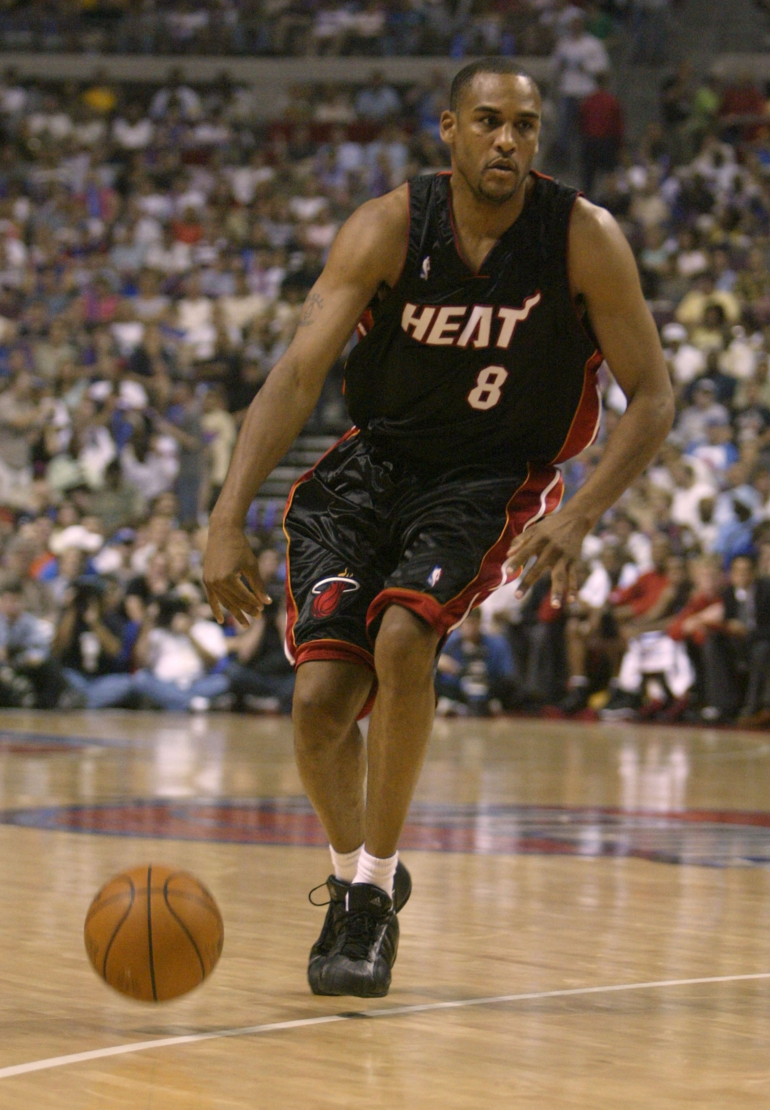 AUBURN HILLS, MI - JUNE 4: Steve Smith #8 of the Miami Heat drives against the Detroit Pistons in Game Six of the Eastern Conference Finals during the 2005 NBA Playoffs June 4, 2005 at the Palace At Auburn Hills in Auburn Hills, Michigan. The Pistons won AUBURN HILLS, MI - JUNE 4: Steve Smith #8 of the Miami Heat drives against the Detroit Pistons in Game Six of the Eastern Conference Finals during the 2005 NBA Playoffs June 4, 2005 at the Palace At Auburn Hills in Auburn Hills, Michigan. The Pistons won