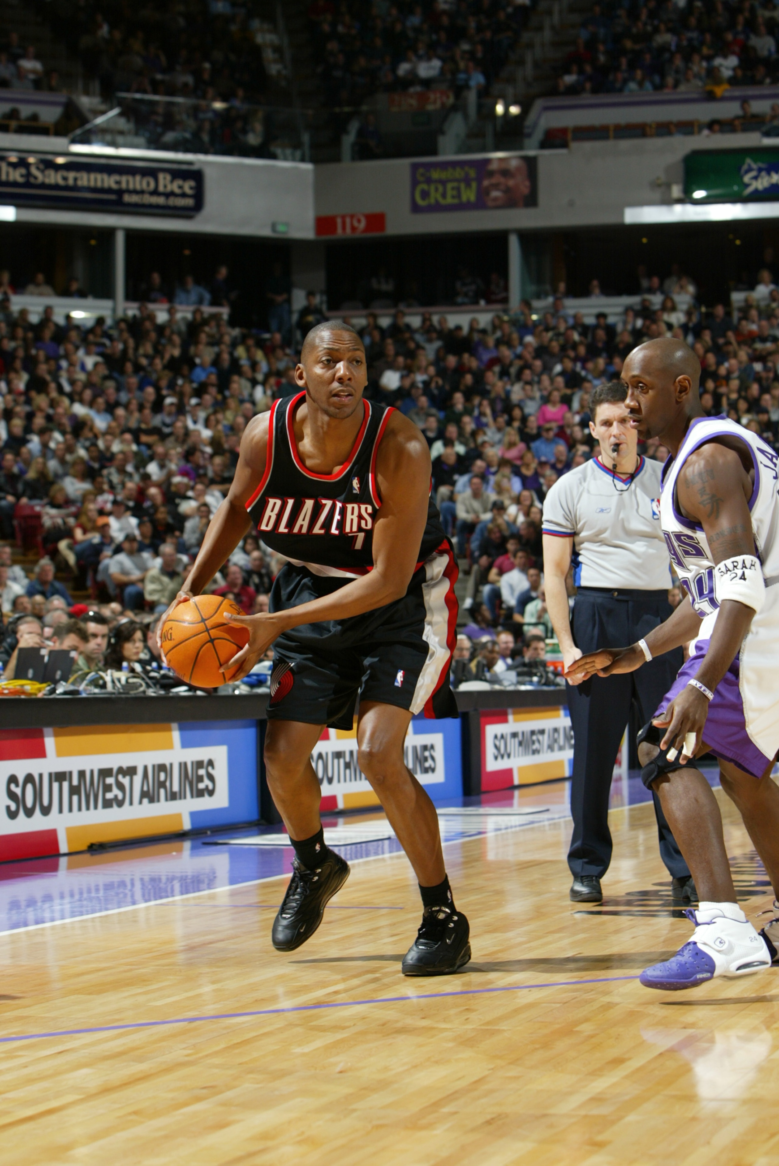 SACRAMENTO, CA - DECEMBER 21: Wesley Person #7 of the Portland Trail Blazers is defended by Bobby Jackson #24 of the Sacramento Kings during the game at Arco Arena on December 21, 2003 in Sacramento, California. The Kings won 117-98. NOTE TO USER: Use SACRAMENTO, CA - DECEMBER 21: Wesley Person #7 of the Portland Trail Blazers is defended by Bobby Jackson #24 of the Sacramento Kings during the game at Arco Arena on December 21, 2003 in Sacramento, California. The Kings won 117-98. NOTE TO USER: Use