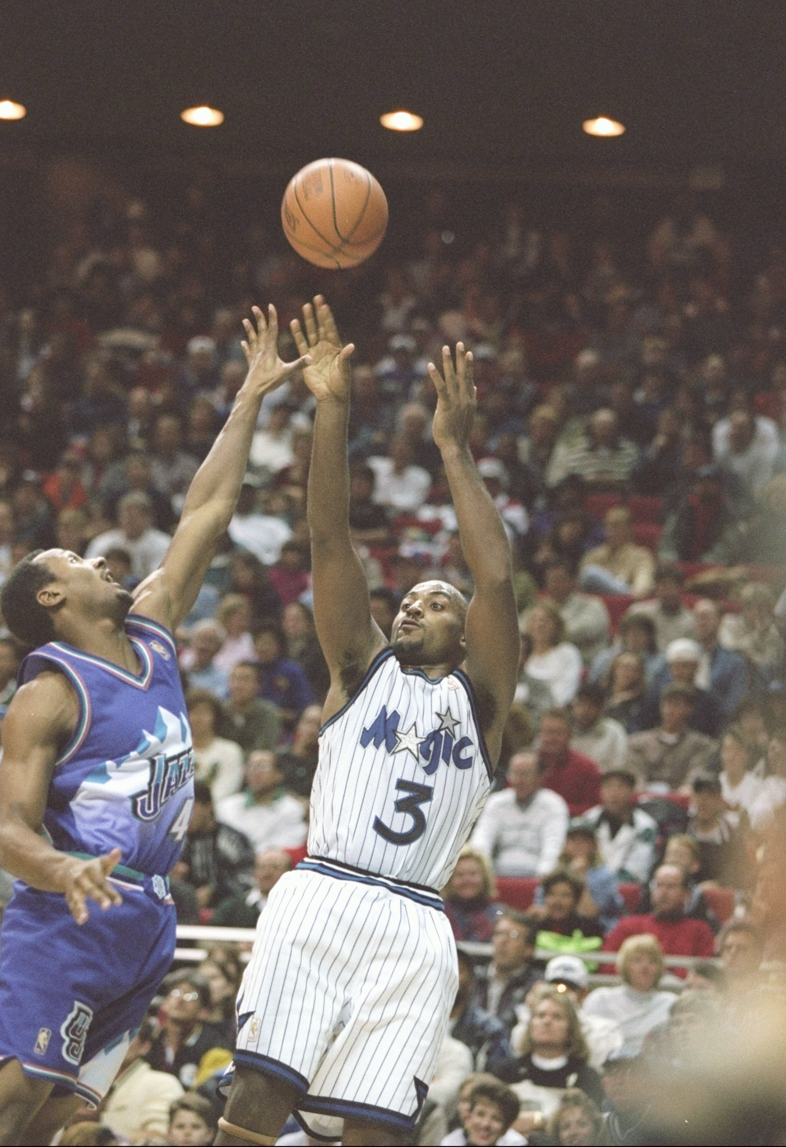 21 Dec 1996: Forward Dennis Scott of the Orlando Magic shoots the ball during a game against the Utah Jazz at the Orlando Arena in Orlando, Florida. The Jazz won the game 98-93. Mandatory Credit: Andy Lyons /Allsport 21 Dec 1996: Forward Dennis Scott of the Orlando Magic shoots the ball during a game against the Utah Jazz at the Orlando Arena in Orlando, Florida. The Jazz won the game 98-93. Mandatory Credit: Andy Lyons /Allsport
