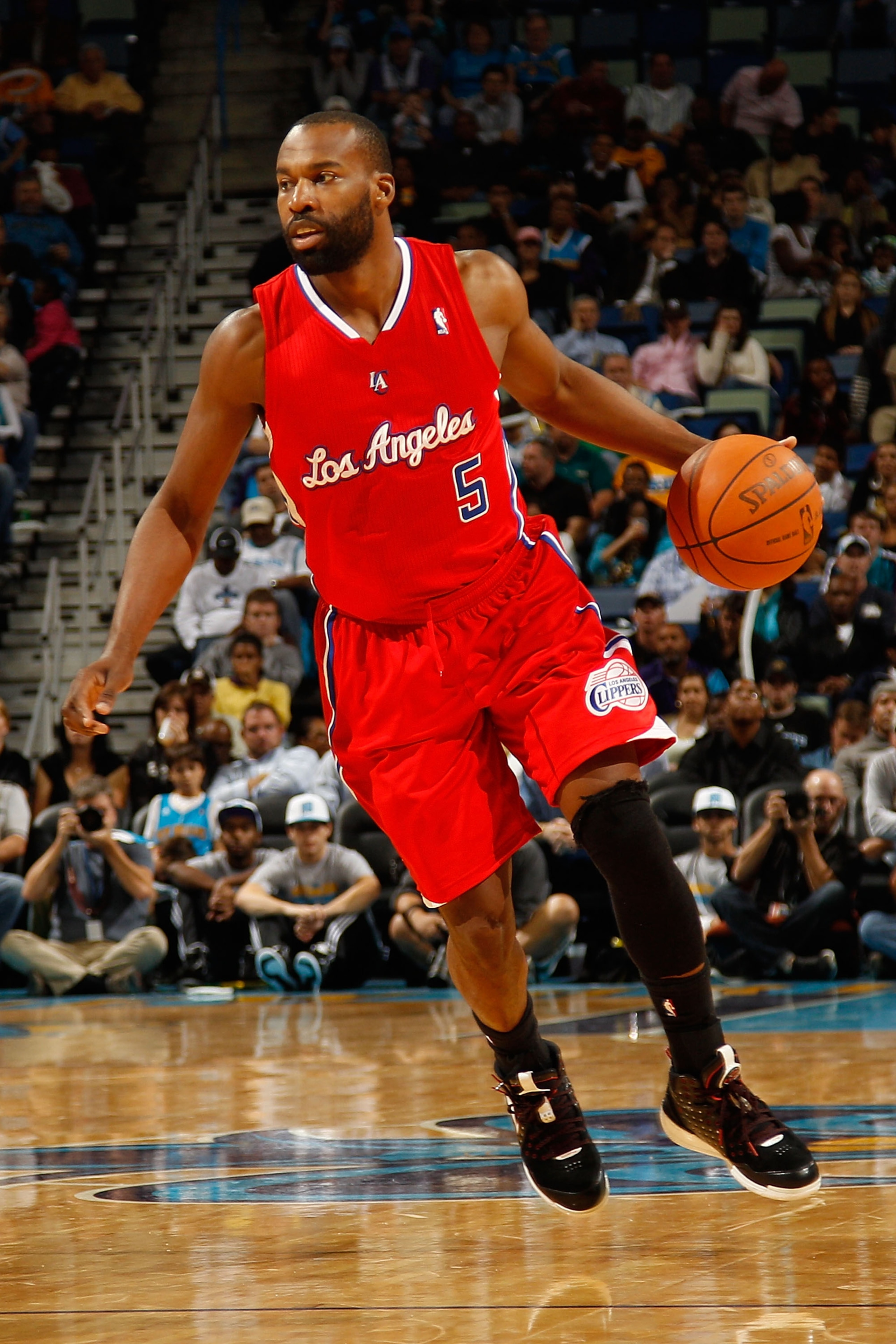 NEW ORLEANS - NOVEMBER 09: Baron Davis #5 of the Los Angeles Clippers drives the ball down the court during the game against the New Orleans Hornets at the New Orleans Arena on November 9, 2010 in New Orleans, Louisiana. The Hornets defeated the Clippers NEW ORLEANS - NOVEMBER 09: Baron Davis #5 of the Los Angeles Clippers drives the ball down the court during the game against the New Orleans Hornets at the New Orleans Arena on November 9, 2010 in New Orleans, Louisiana. The Hornets defeated the Clippers