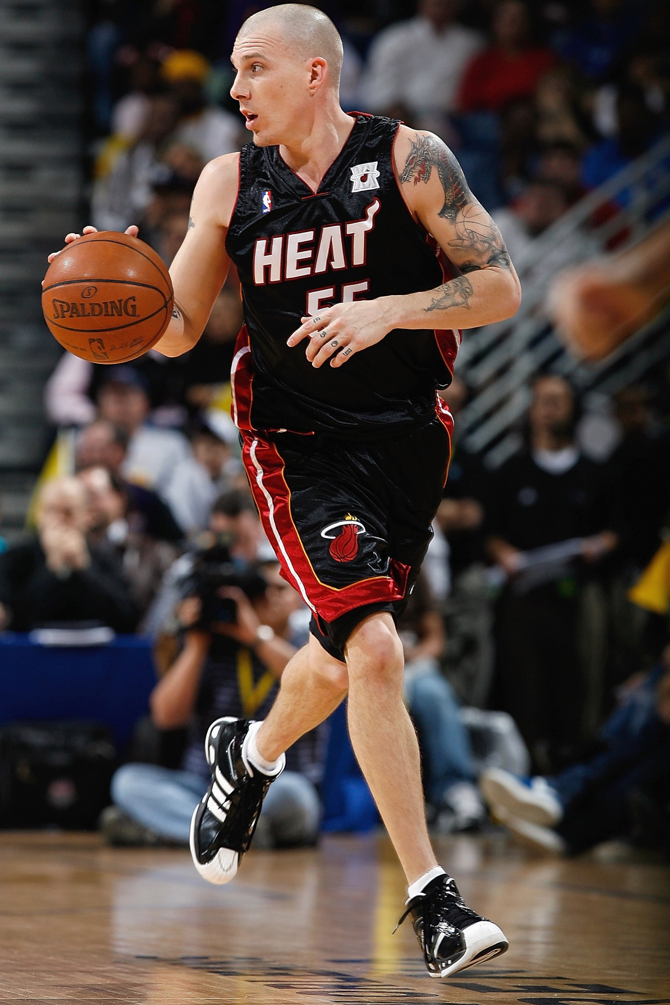 NEW ORLEANS - JANUARY 11: Jason Williams #55 of the Miami Heat moves the ball against the New Orleans Hornets on January 11, 2008 at the New Orleans Arena in New Orleans, Louisiana. The Hornets won 114-88. NOTE TO USER: User expressly acknowledges and ag NEW ORLEANS - JANUARY 11: Jason Williams #55 of the Miami Heat moves the ball against the New Orleans Hornets on January 11, 2008 at the New Orleans Arena in New Orleans, Louisiana. The Hornets won 114-88. NOTE TO USER: User expressly acknowledges and ag