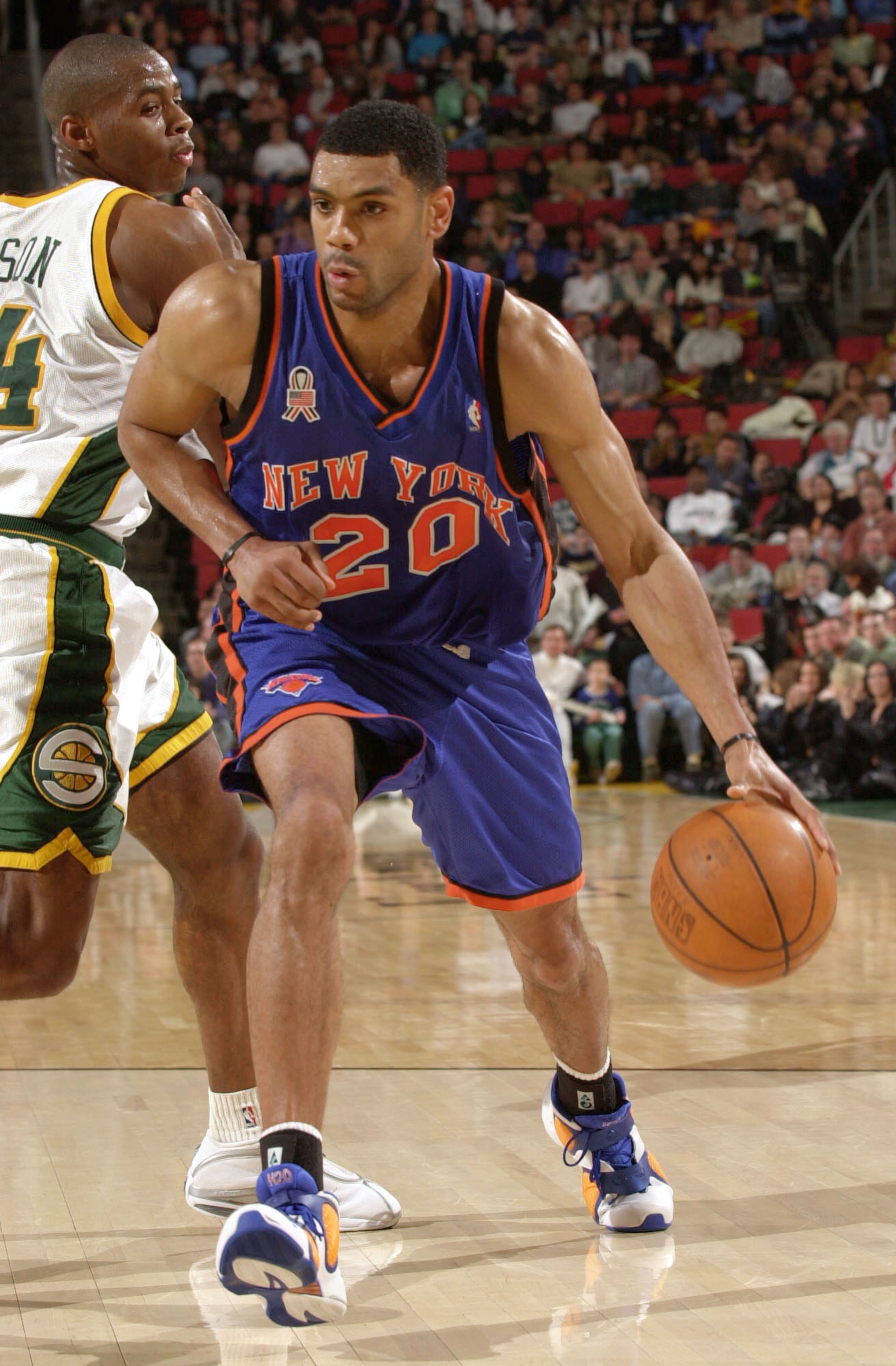 05 APR 2002: Allan Houston #20 of the New York Knicks drives against Desmond Mason of the Seattle SuperSonics during first half action at Key Arena in Seattle, Washington. The Knicks defeated the Sonics 86-83. Digital Image . DIGITAL IMAGE NOTE TO 05 APR 2002: Allan Houston #20 of the New York Knicks drives against Desmond Mason of the Seattle SuperSonics during first half action at Key Arena in Seattle, Washington. The Knicks defeated the Sonics 86-83. Digital Image . DIGITAL IMAGE NOTE TO