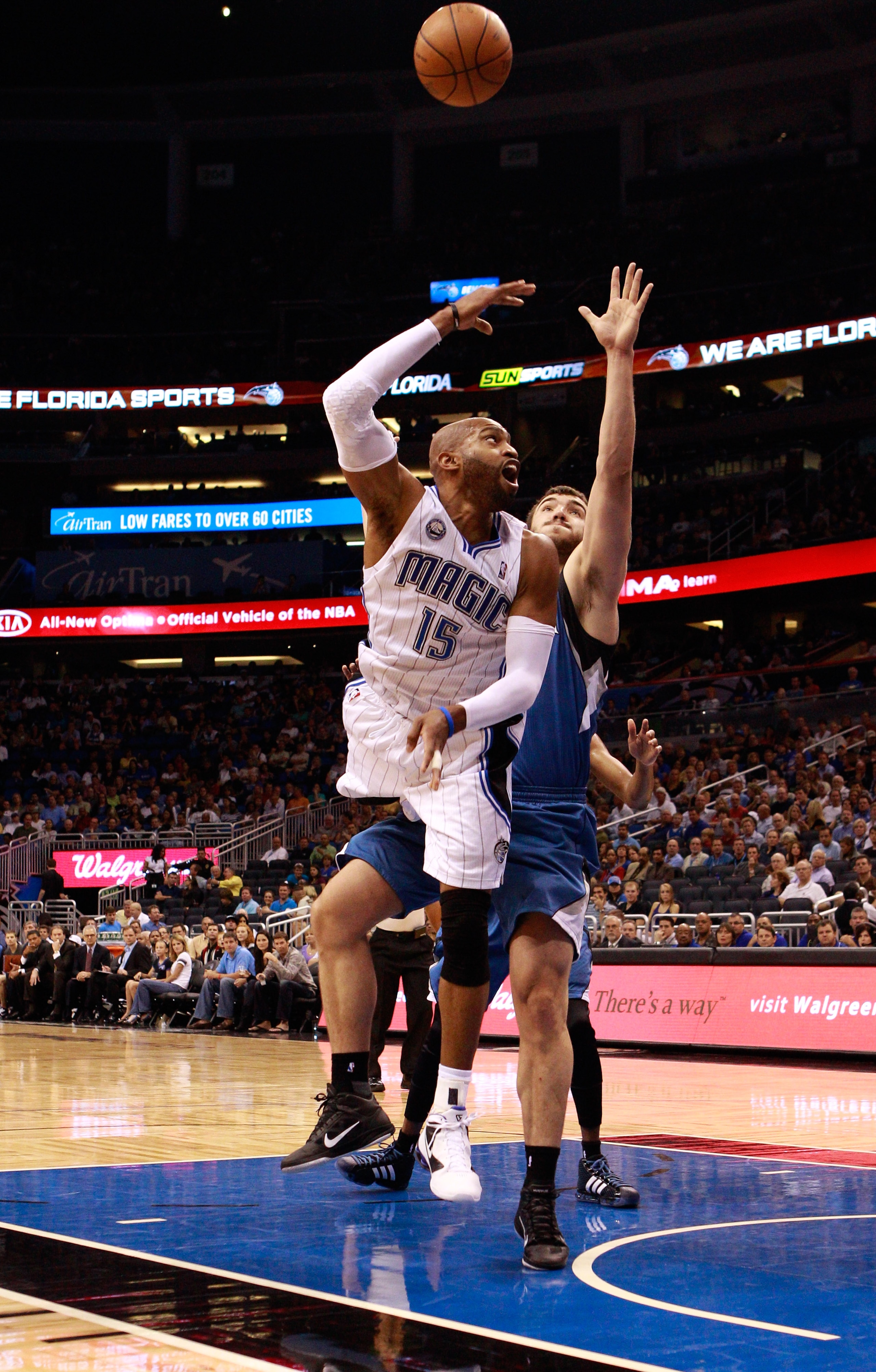 ORLANDO, FL - NOVEMBER 03: Vince Carter #15 of the Orlando Magic drives against Nikola Pekovic #14 of the Minnesota Timberwolves during the game at Amway Arena on November 3, 2010 in Orlando, Florida. NOTE TO USER: User expressly acknowledges and agrees ORLANDO, FL - NOVEMBER 03: Vince Carter #15 of the Orlando Magic drives against Nikola Pekovic #14 of the Minnesota Timberwolves during the game at Amway Arena on November 3, 2010 in Orlando, Florida. NOTE TO USER: User expressly acknowledges and agrees