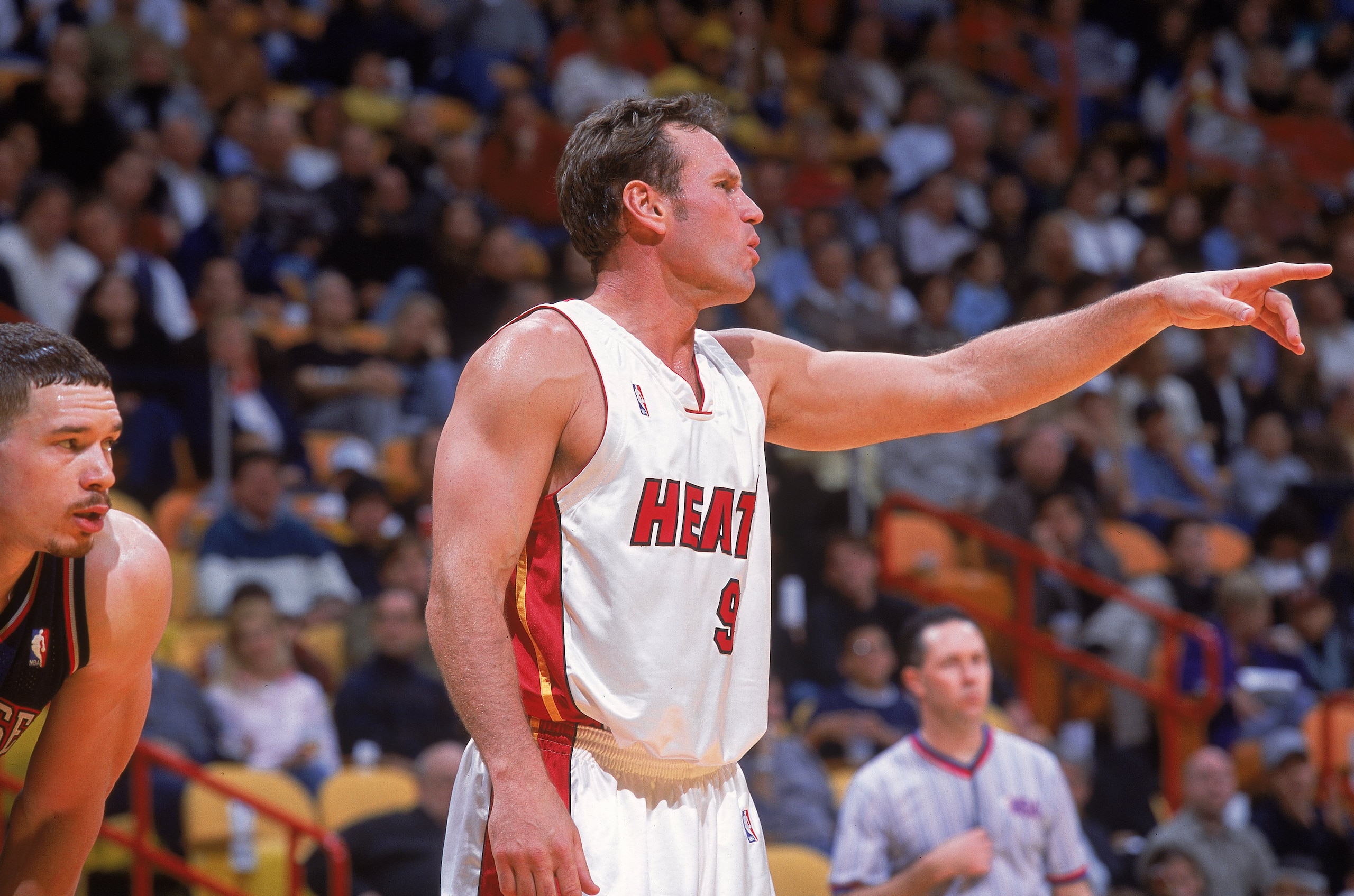 4 Jan 2001: Dan Majerle #9 of the Miami Heat reacts to a play as Aaron Williams #34 of the New Jersey Nets looks on during the game at the American Airlines Arena in Miami, Florida. The Heat defeated the Nets 81-78. NOTE TO USER: It is expressly unders 4 Jan 2001: Dan Majerle #9 of the Miami Heat reacts to a play as Aaron Williams #34 of the New Jersey Nets looks on during the game at the American Airlines Arena in Miami, Florida. The Heat defeated the Nets 81-78. NOTE TO USER: It is expressly unders