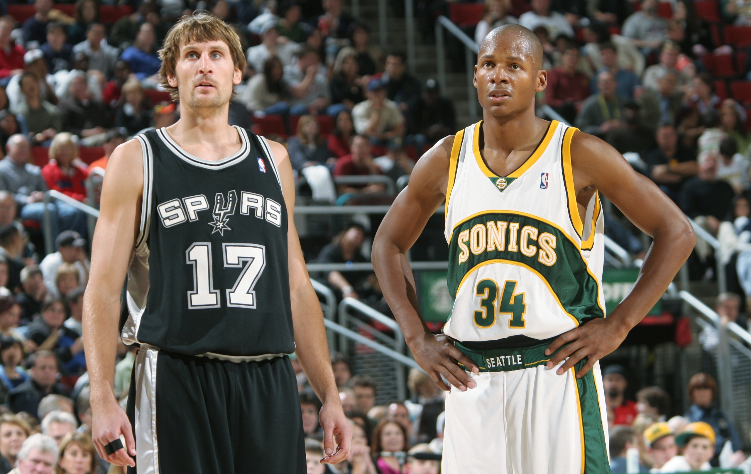 SEATTLE - NOVEMBER 7: Brent Barry #17 of the San Antonio Spurs stands on the court next to Ray Allen #34 of the Seattle Sonics during the game at Key Arena on November 7, 2004 in Seattle, Washington. The Sonics won 113-94. NOTE TO USER: User expressly a SEATTLE - NOVEMBER 7: Brent Barry #17 of the San Antonio Spurs stands on the court next to Ray Allen #34 of the Seattle Sonics during the game at Key Arena on November 7, 2004 in Seattle, Washington. The Sonics won 113-94. NOTE TO USER: User expressly a