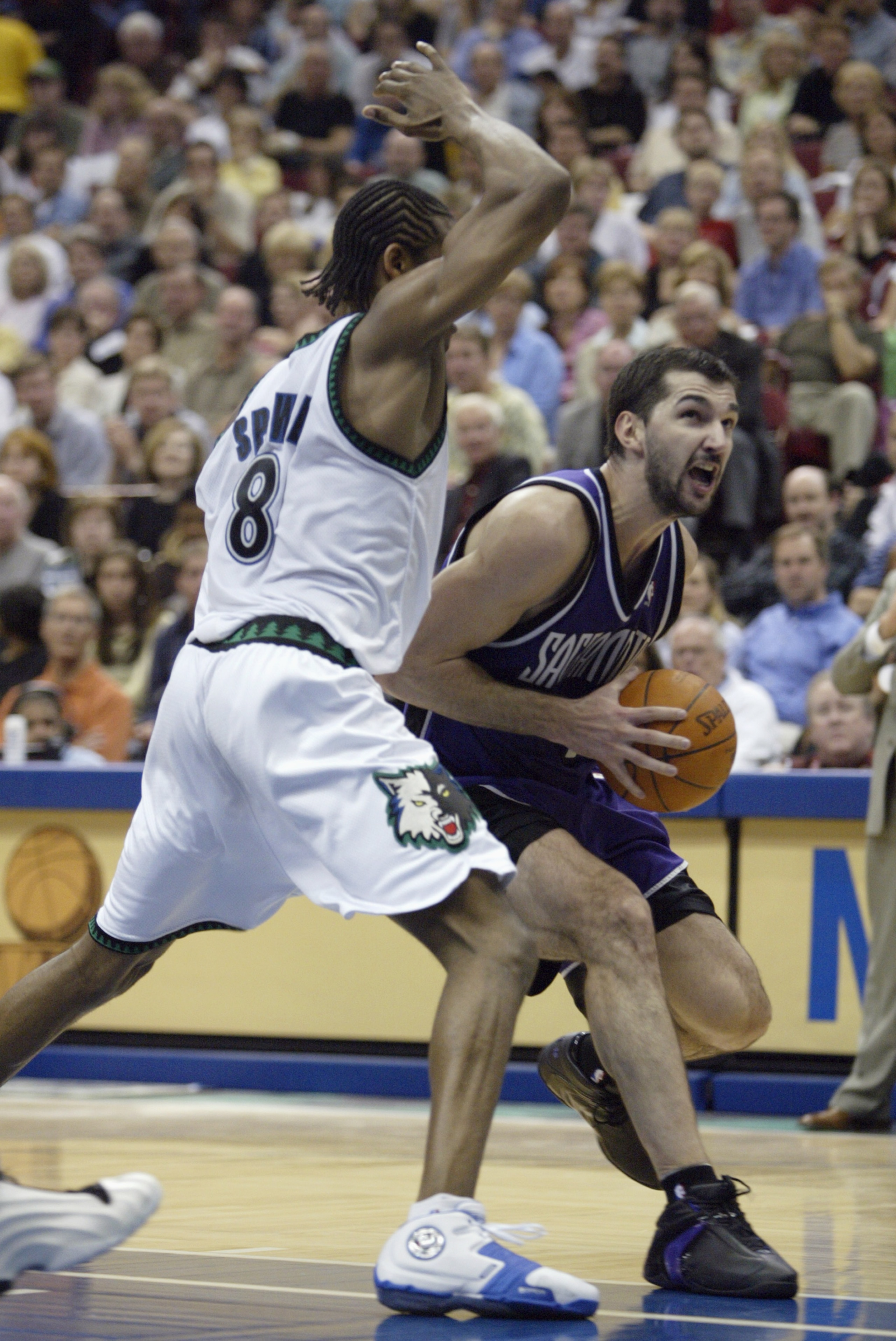 MINNEAPOLIS - MAY 8: Latrell Sprewell #8 of the Minnesota Timberwolves defends Predrag Stojakovich #16 of the Sacramento Kings in Game Two of the Western Conference Semifinals during the 2004 NBA Playoffs on May 8, 2004 at the Target Center in Minneapol MINNEAPOLIS - MAY 8: Latrell Sprewell #8 of the Minnesota Timberwolves defends Predrag Stojakovich #16 of the Sacramento Kings in Game Two of the Western Conference Semifinals during the 2004 NBA Playoffs on May 8, 2004 at the Target Center in Minneapol