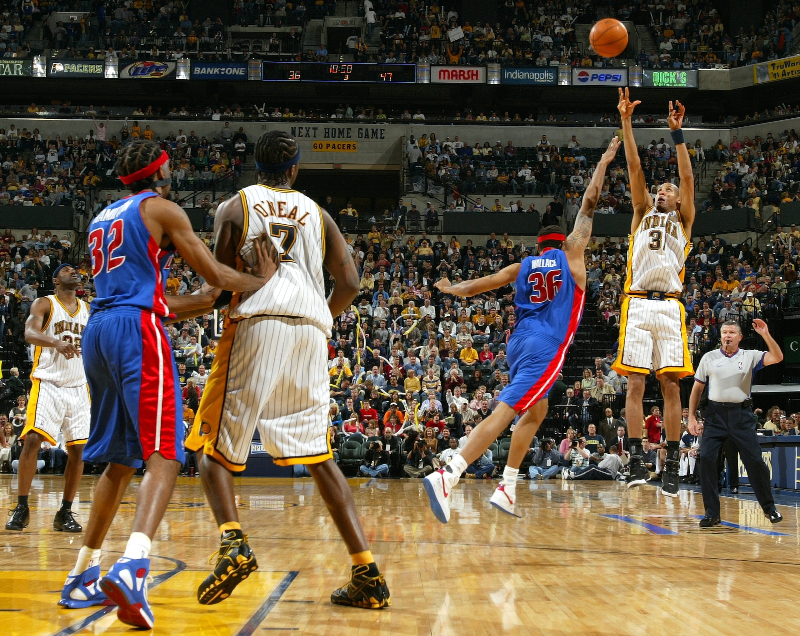 INDIANAPOLIS - MAY 15: Reggie Miller #31 of the the Indiana Pacers tries to get a three point shot off as Rasheed Wallace #36 of the Detroit Pistons defends in Game four of the Eastern Conference Semifinals during the 2005 NBA Playoffs on May 15, 2005 at INDIANAPOLIS - MAY 15: Reggie Miller #31 of the the Indiana Pacers tries to get a three point shot off as Rasheed Wallace #36 of the Detroit Pistons defends in Game four of the Eastern Conference Semifinals during the 2005 NBA Playoffs on May 15, 2005 at