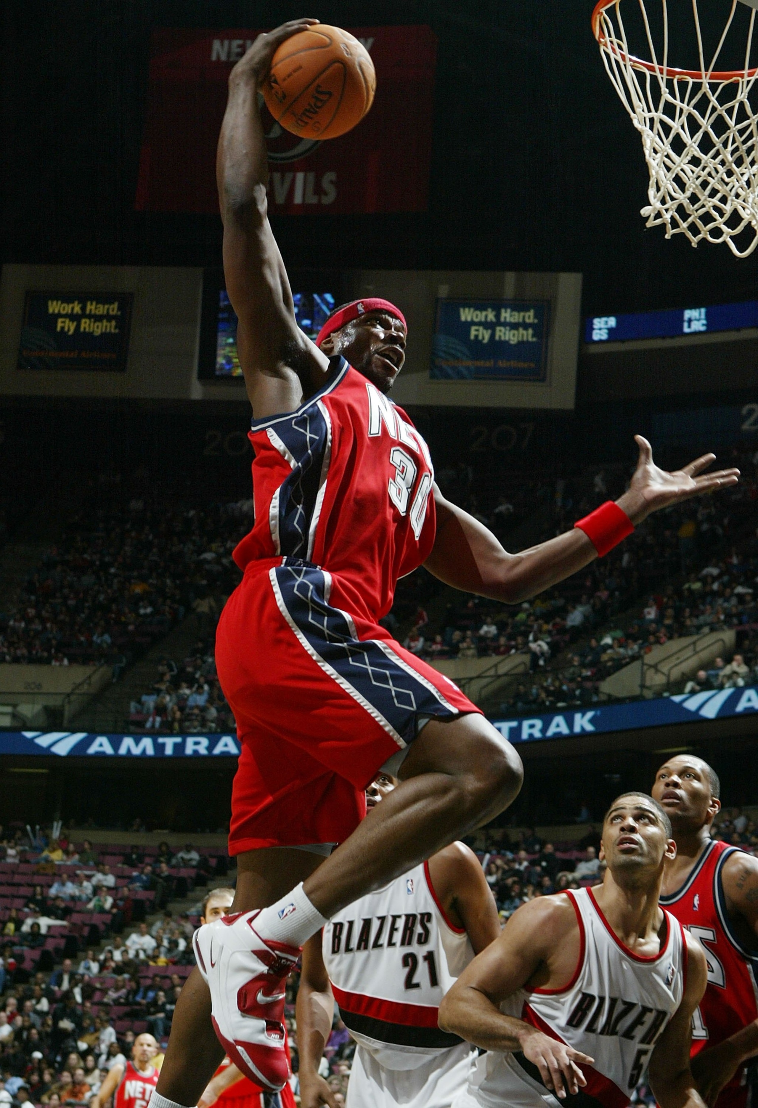 EAST RUTHERFORD, NJ - NOVEMBER 18: Clifford Robinson #30 of the New Jersey Nets grabs a rebound against the Portland Trail Blazers during their game on November 18, 2006 at Continental Airlines Arena in East Rutherford, New Jersey. NOTE TO USER: User expr EAST RUTHERFORD, NJ - NOVEMBER 18: Clifford Robinson #30 of the New Jersey Nets grabs a rebound against the Portland Trail Blazers during their game on November 18, 2006 at Continental Airlines Arena in East Rutherford, New Jersey. NOTE TO USER: User expr
