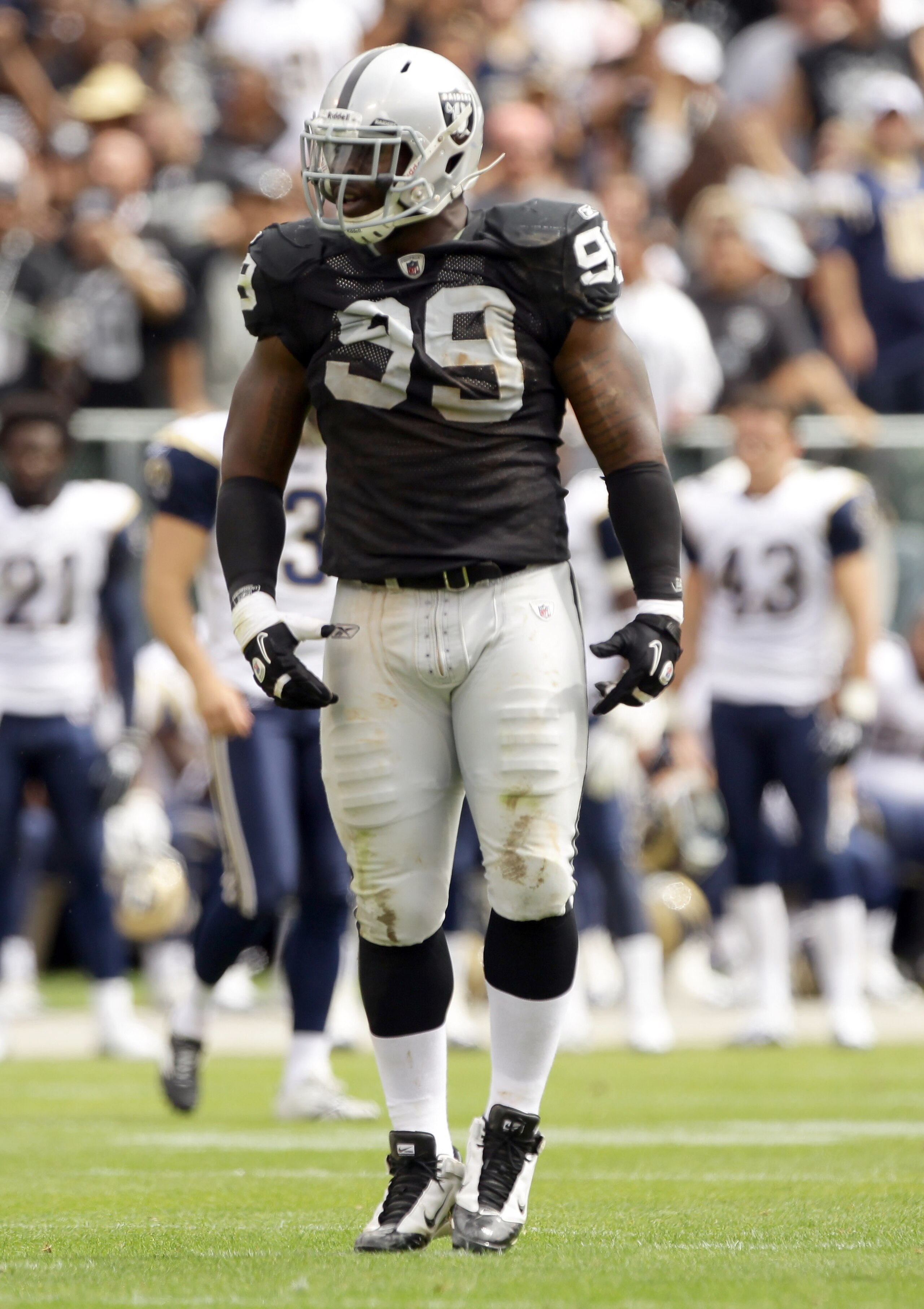 OAKLAND, CA - SEPTEMBER 19:  Lamarr Houston #99 of the Oakland Raiders in action during their game against the St. Louis Rams at the Oakland-Alameda County Coliseum on September 19, 2010 in Oakland, California.  (Photo by Ezra Shaw/Getty Images)