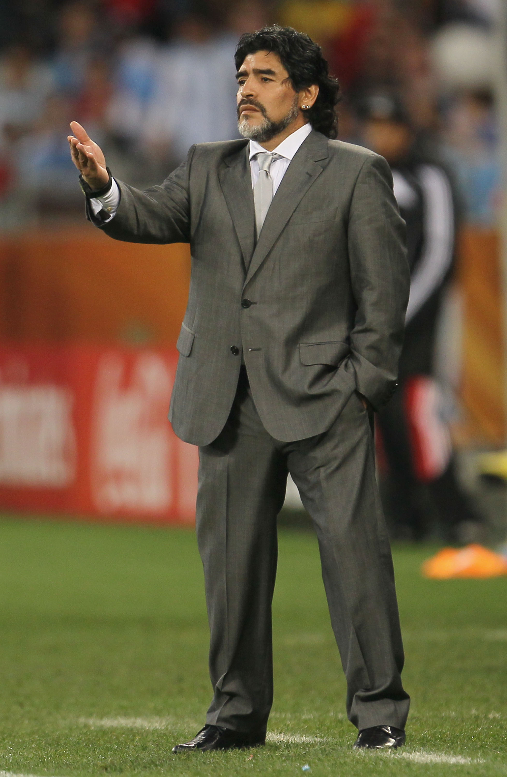 CAPE TOWN, SOUTH AFRICA - JULY 03:  Diego Maradona head coach of Argentina gestures during the 2010 FIFA World Cup South Africa Quarter Final match between Argentina and Germany at Green Point Stadium on July 3, 2010 in Cape Town, South Africa.  (Photo by