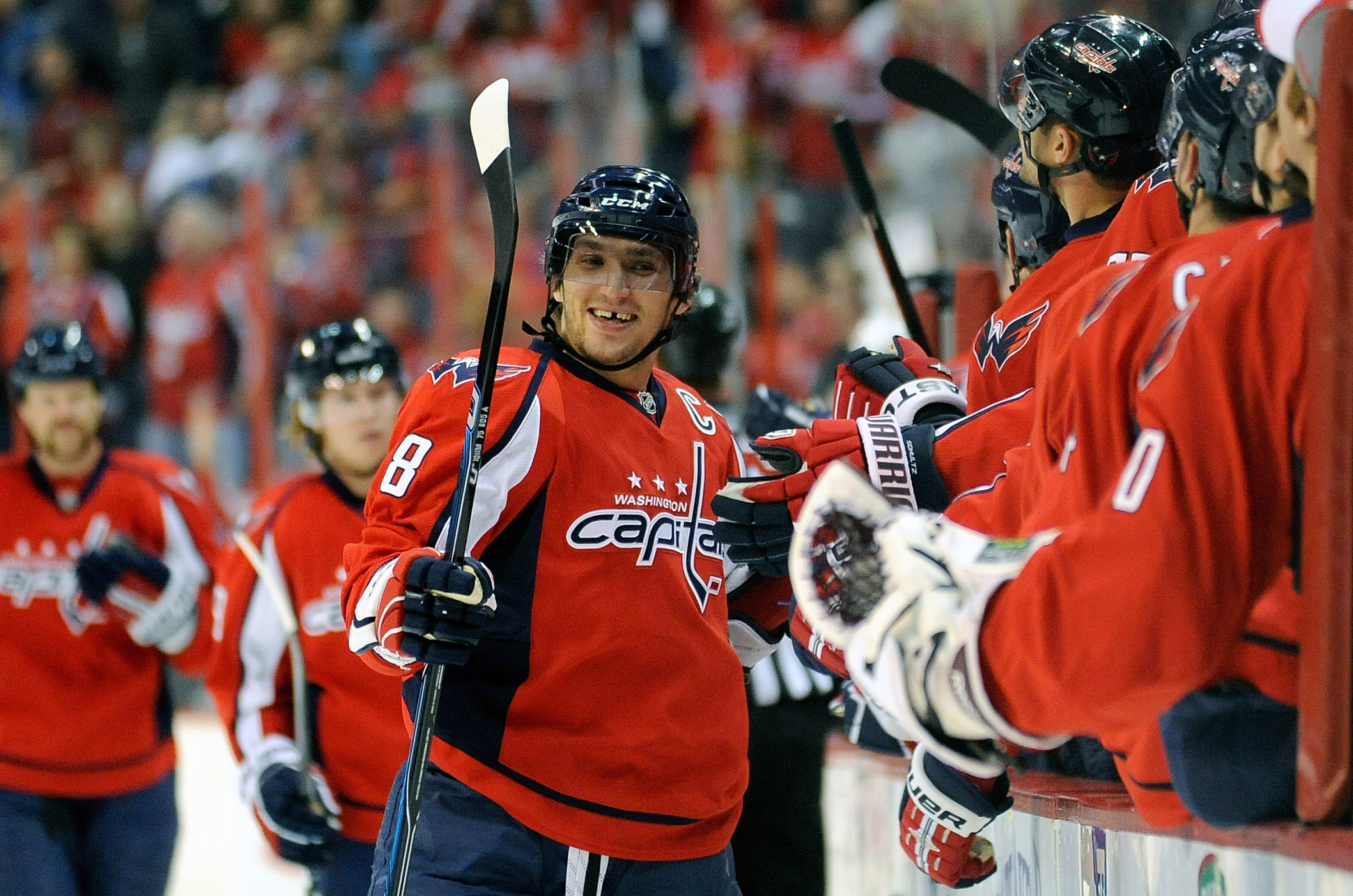 WASHINGTON - NOVEMBER 14:  Alex Ovechkin #8 of the Washington Capitals celebrates with teammates after scoring in the first period against the Atlanta Thrashers at the Verizon Center on November 14, 2010 in Washington, DC.  (Photo by Greg Fiume/Getty Imag