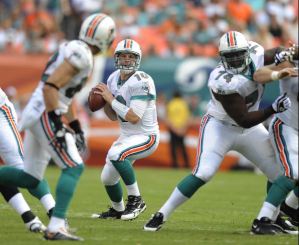 Chad Pennington of the Miami Dolphins looks for a receiver during the  News Photo - Getty Images