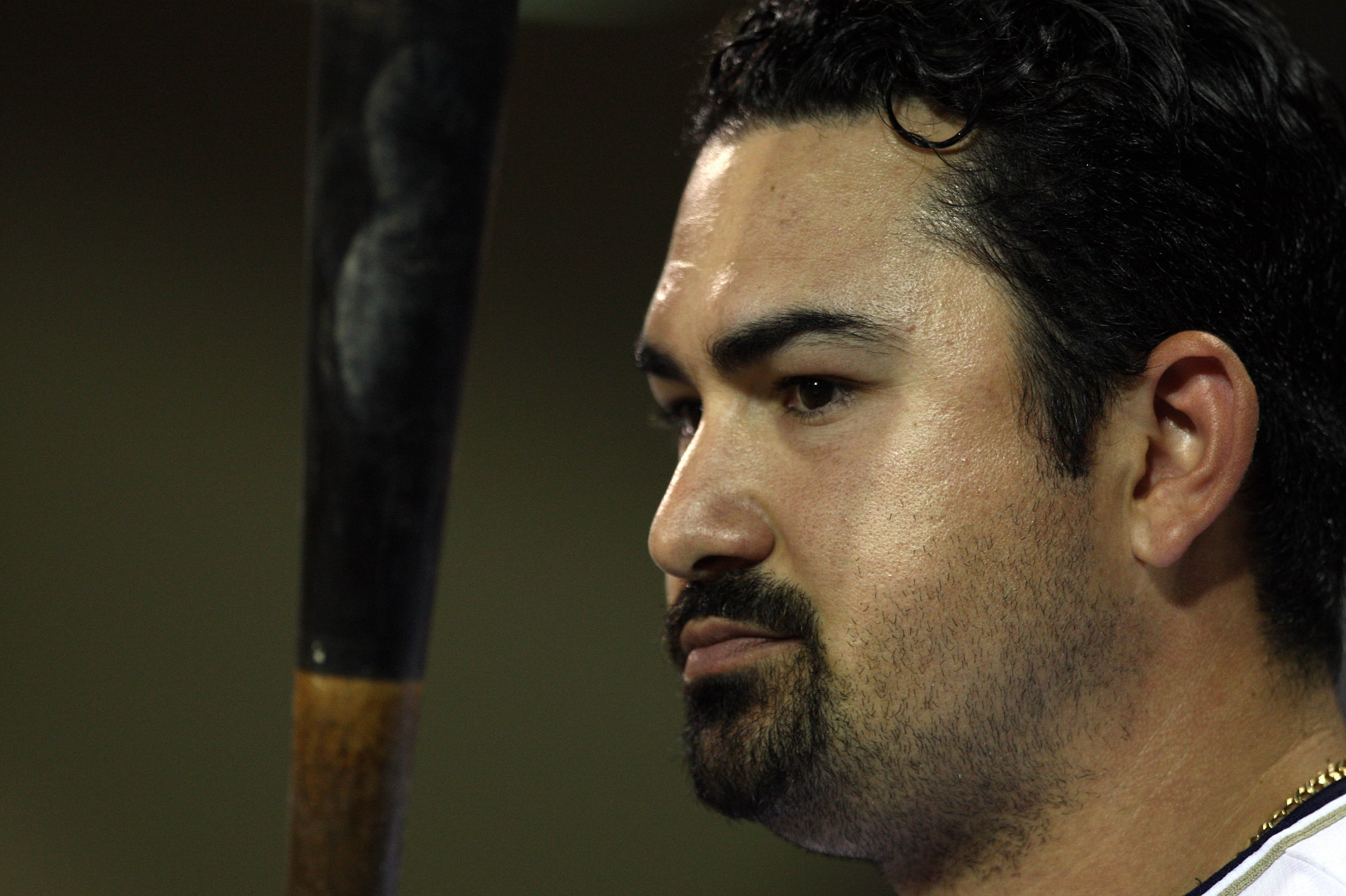 SAN DIEGO, CA - SEPTEMBER 10: Adrian Gonzalez #23 of the San Diego Padres looks on against the San Francisco Giants during their MLB game on September 10, 2010 at Petco Park in San Diego, California. (Photo by Donald Miralle/Getty Images)