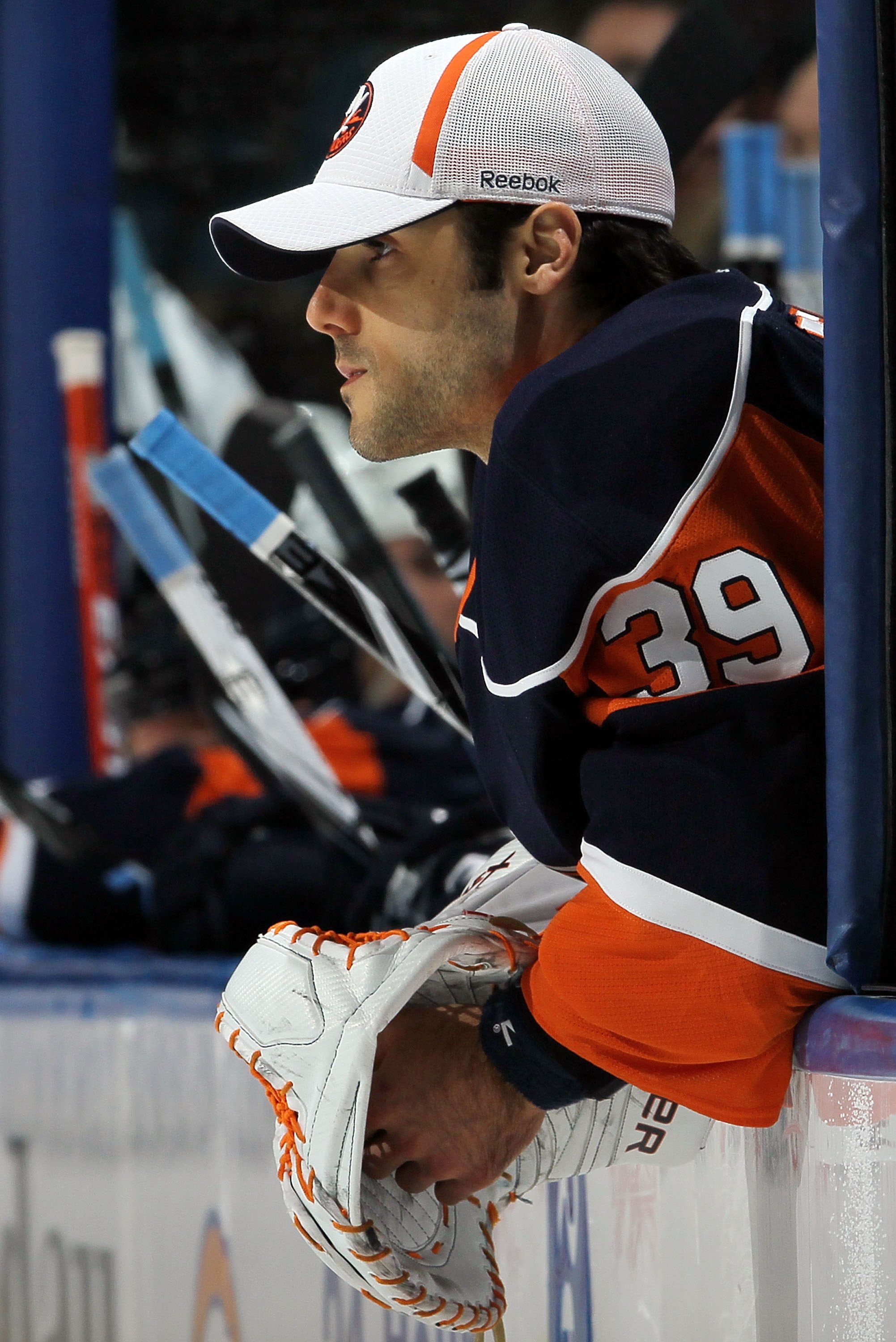 Rick DiPietro #39 of the New York Islanders, while wearing…