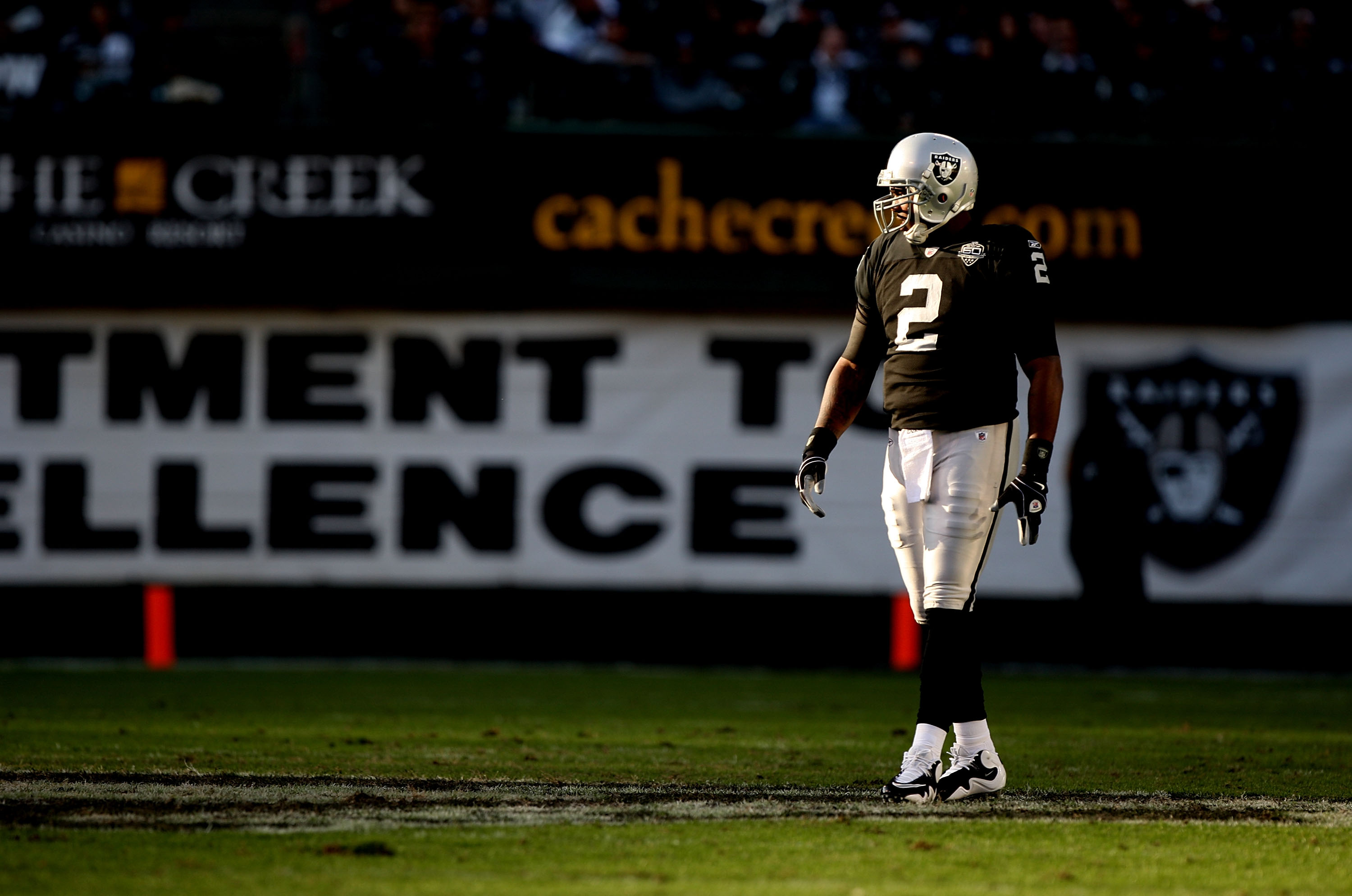 OAKLAND, CA - JANUARY 03: JaMarcus Russell #2 of the Oakland Raiders looks on against the Baltimore Ravens during an NFL game at Oakland-Alameda County Coliseum on January 3, 2010 in Oakland, California. (Photo by Jed Jacobsohn/Getty Images)