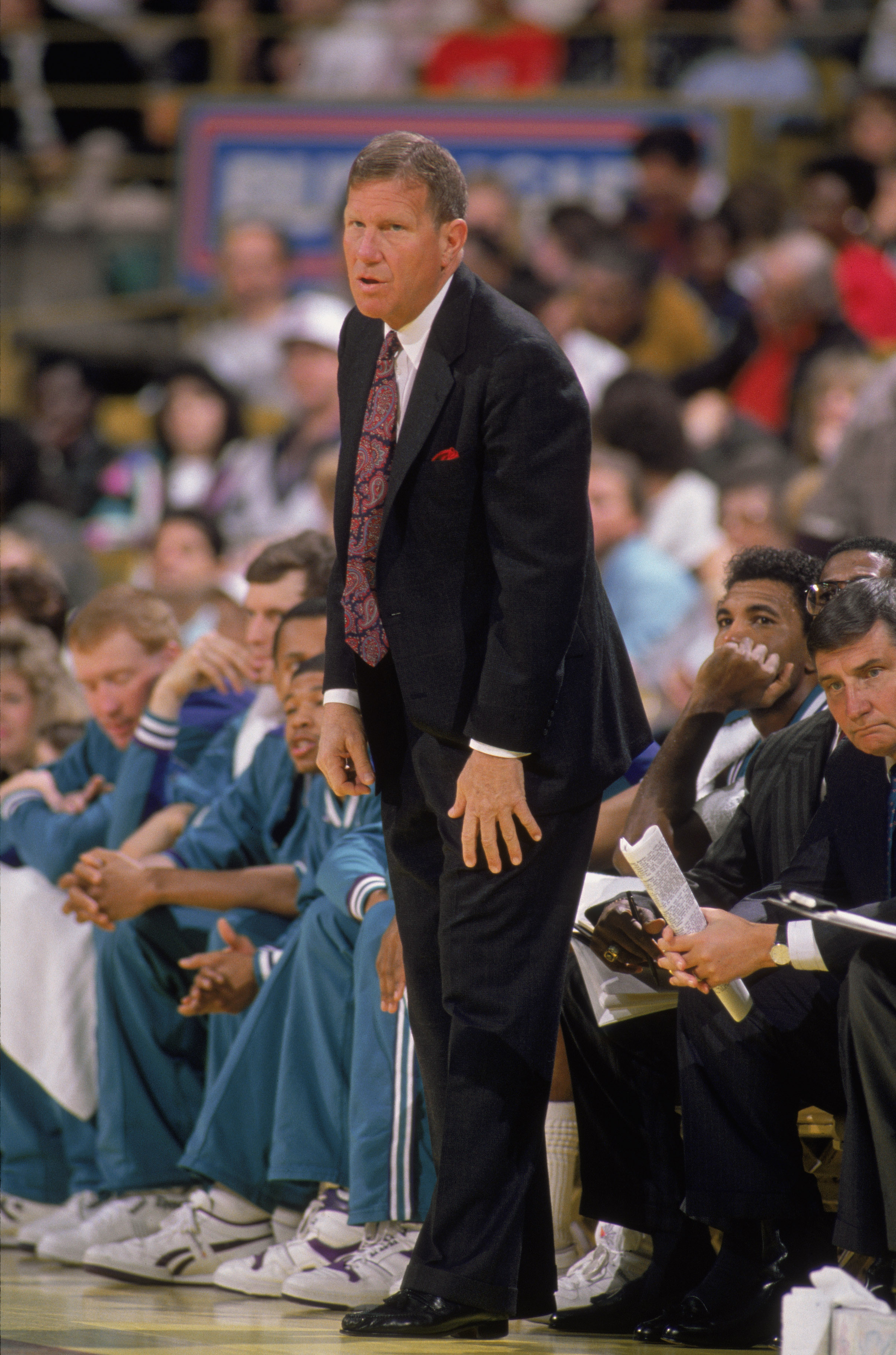 CHARLOTTE, NC - 1989:  Head coach Dick Harter of the Charlotte Hornets stands on the sideline during an NBA game at Charlotte Colesium in 1989. (Photo by Tim Defrisco/Getty Images)