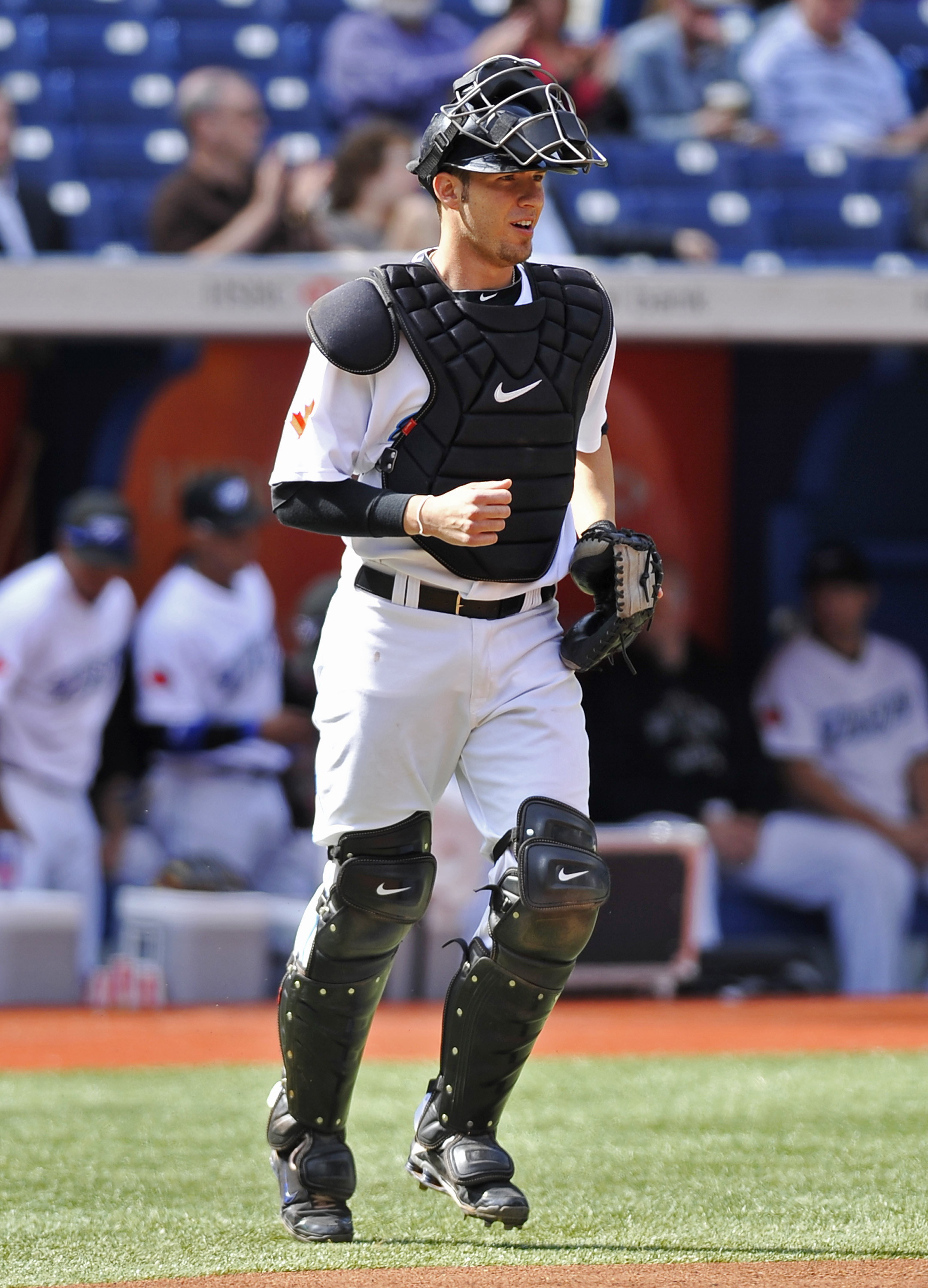 Miami Marlins catcher Miguel Olivo, right, talks to relief pitcher