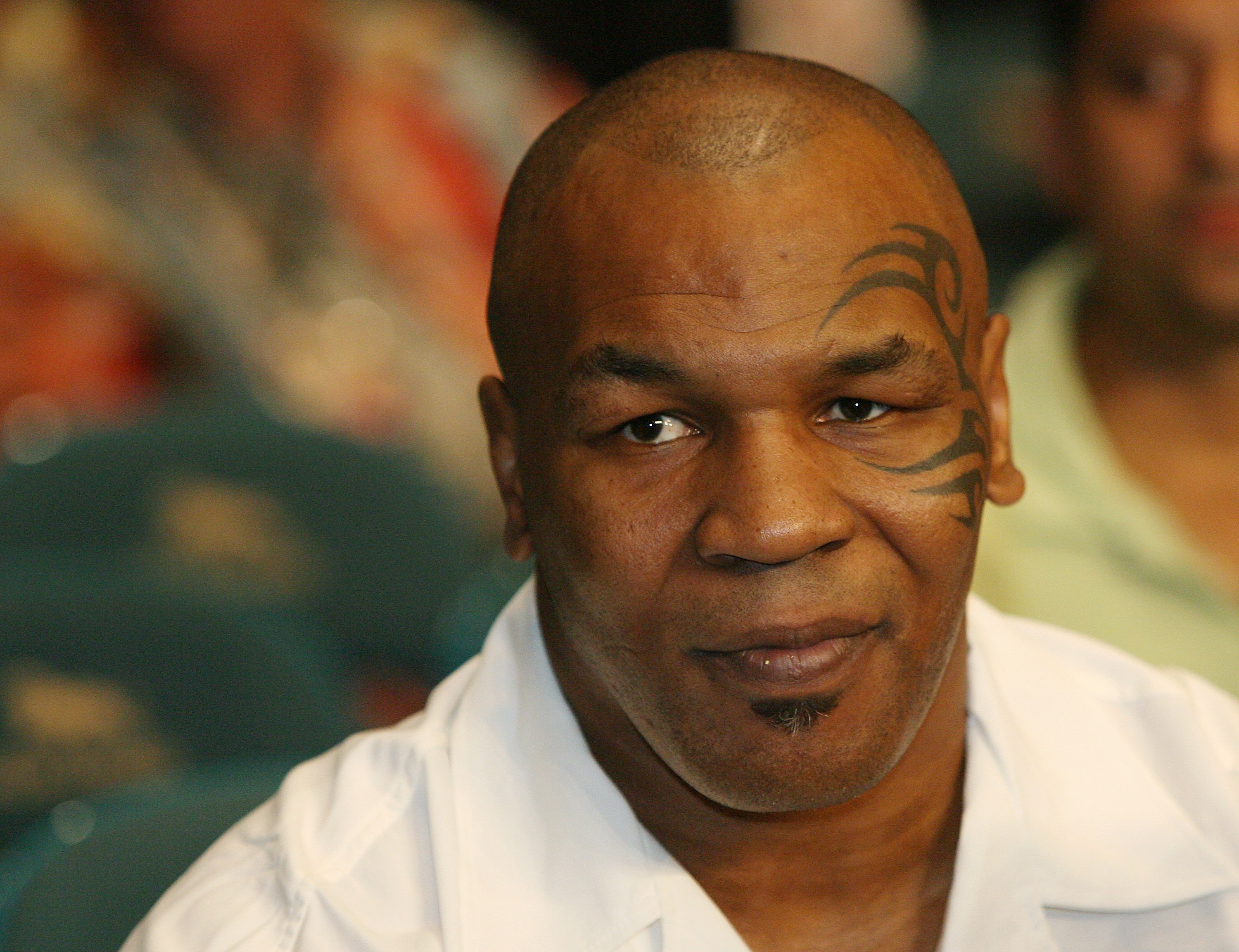LAS VEGAS - JULY 26:  Former boxer Mike Tyson sits in the crowd before the interim WBA light flyweight title fight between Cesar Canchila and Giovani Segura at the MGM Grand Garden Arena July 26, 2008 in Las Vegas, Nevada.  (Photo by Ethan Miller/Getty Im