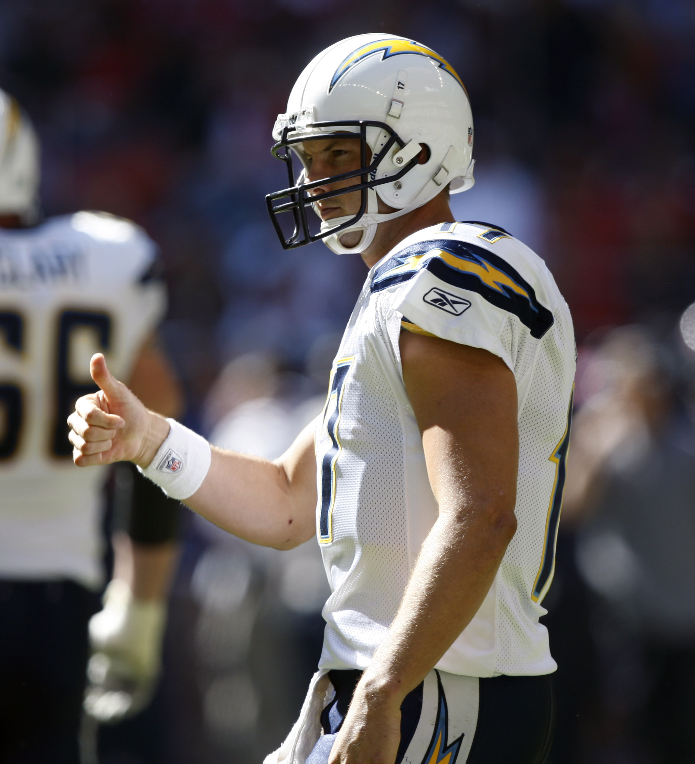 HOUSTON - NOVEMBER 07:  Quarterback Philips #17 of the San Diego Chargers gives a thumbs up to he bench after a touchdown against the Houston Texans at Reliant Stadium on November 7, 2010 in Houston, Texas.  (Photo by Bob Levey/Getty Images)