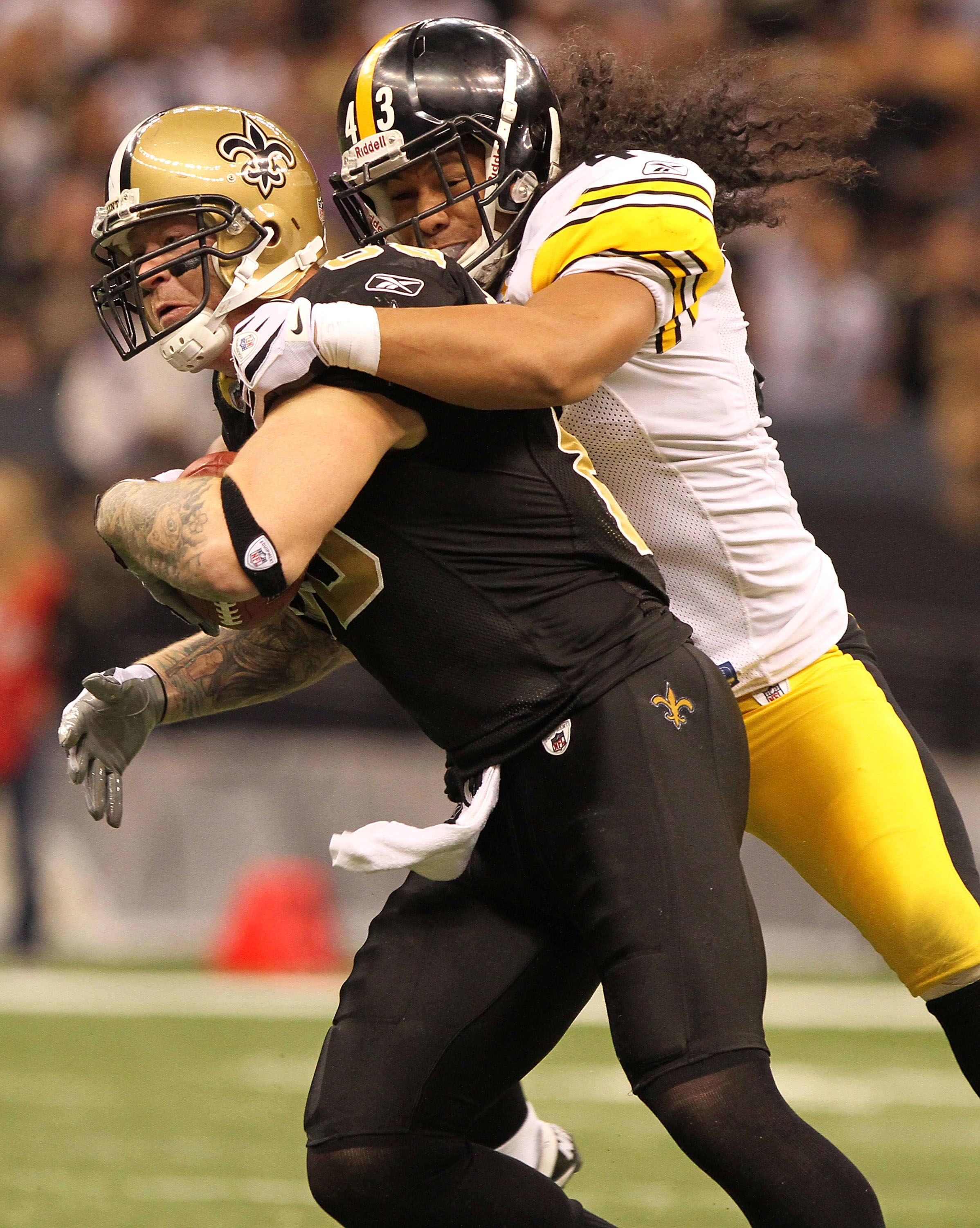 NEW ORLEANS, LA - OCTOBER 31: Jeremy Shockey #88 of the New Orleans Saints is tackled by Troy Polamalu #43 of the Pittsburgh Steelers at the Louisiana Superdome on October 31, 2010 in New Orleans, Louisiana. (Photo by Matthew Sharpe/Getty Images)