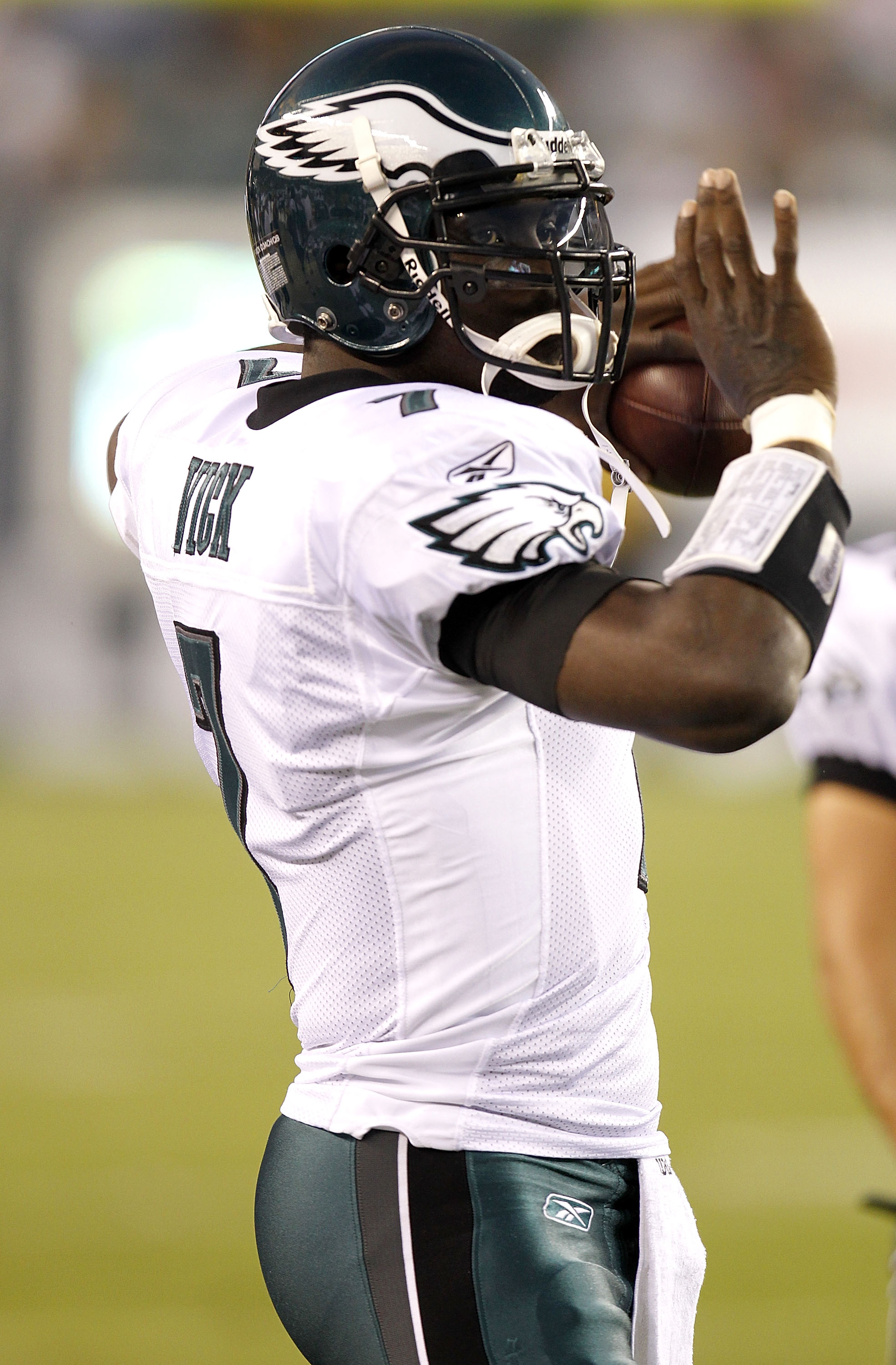 Quarterback Michael Vick of the Atlanta Falcons drops back to pass