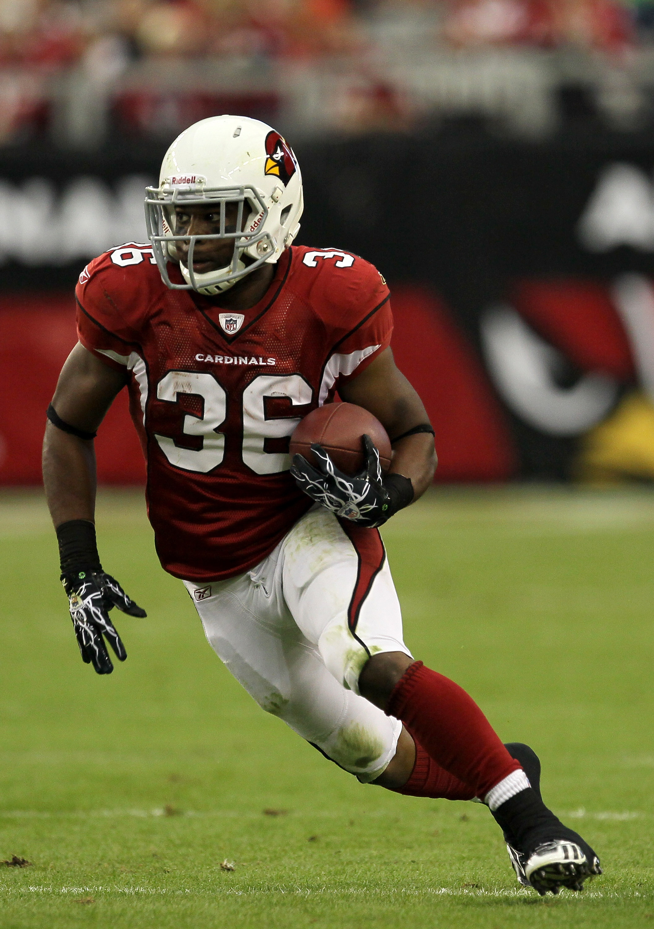 Tim Hightower of the Arizona Cardinal carries the ball against the