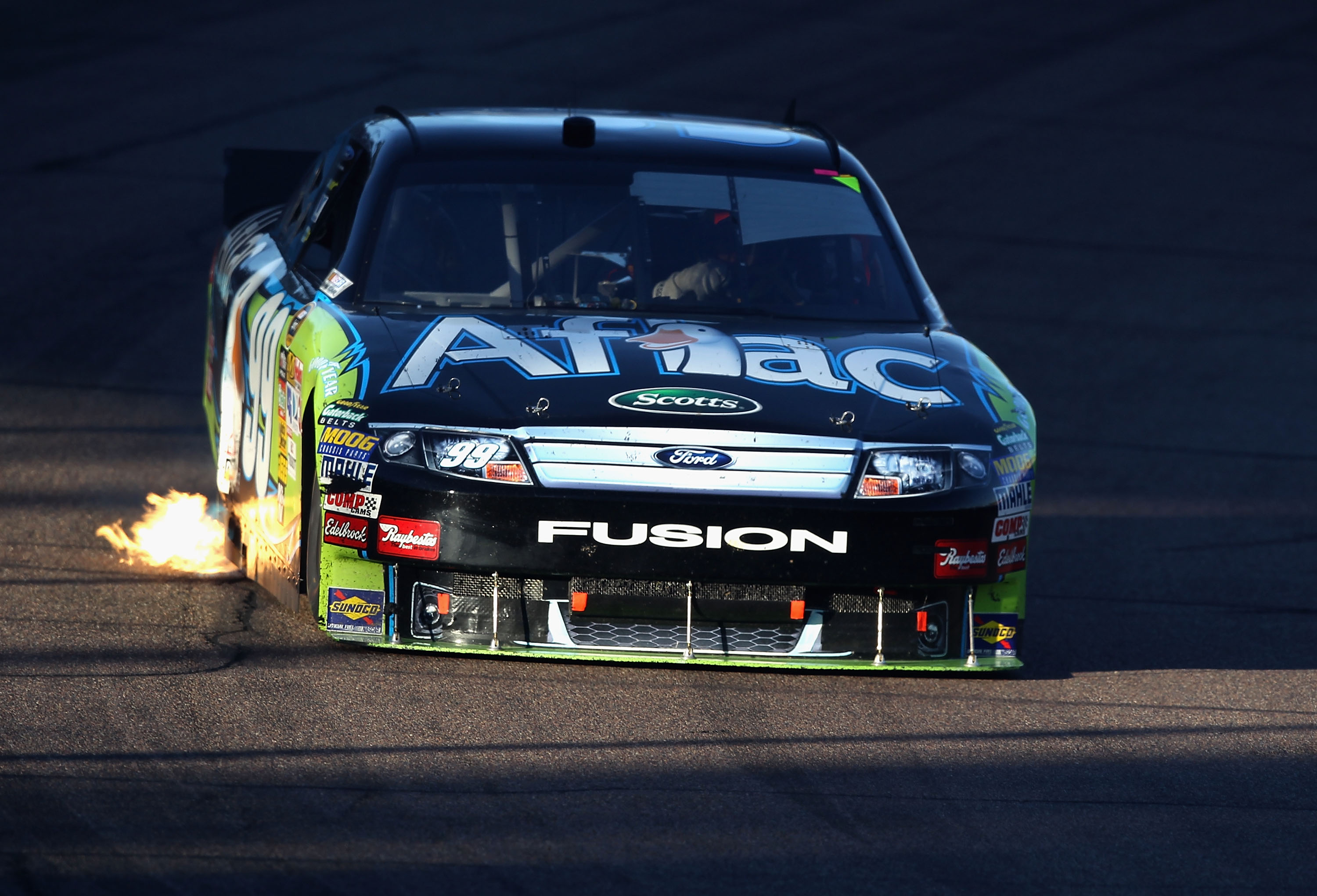 AVONDALE, AZ - NOVEMBER 14:  Carl Edwards, driver of the #99 Aflac Ford, drives during the NASCAR Sprint Cup Series Kobalt Tools 500 at Phoenix International Raceway on November 14, 2010 in Avondale, Arizona.  (Photo by Christian Petersen/Getty Images for