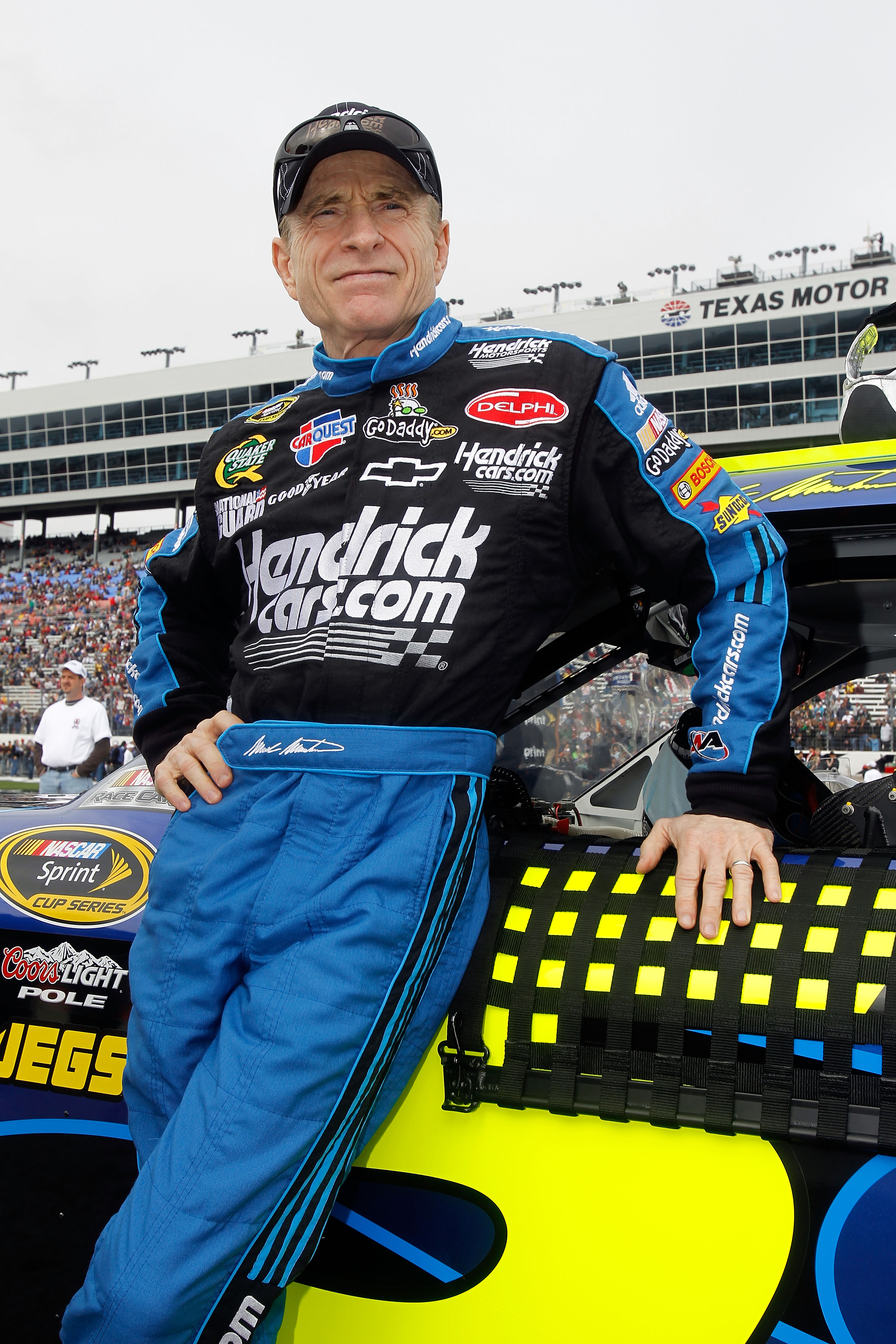FORT WORTH, TX - APRIL 19:  Mark Martin, driver of the #5 Hendricks.com/GoDaddy.com Chevrolet, looks on prior to the start of the NASCAR Sprint Cup Series Samsung Mobile 500 at Texas Motor Speedway on April 19, 2010 in Fort Worth, Texas.  (Photo by Todd W