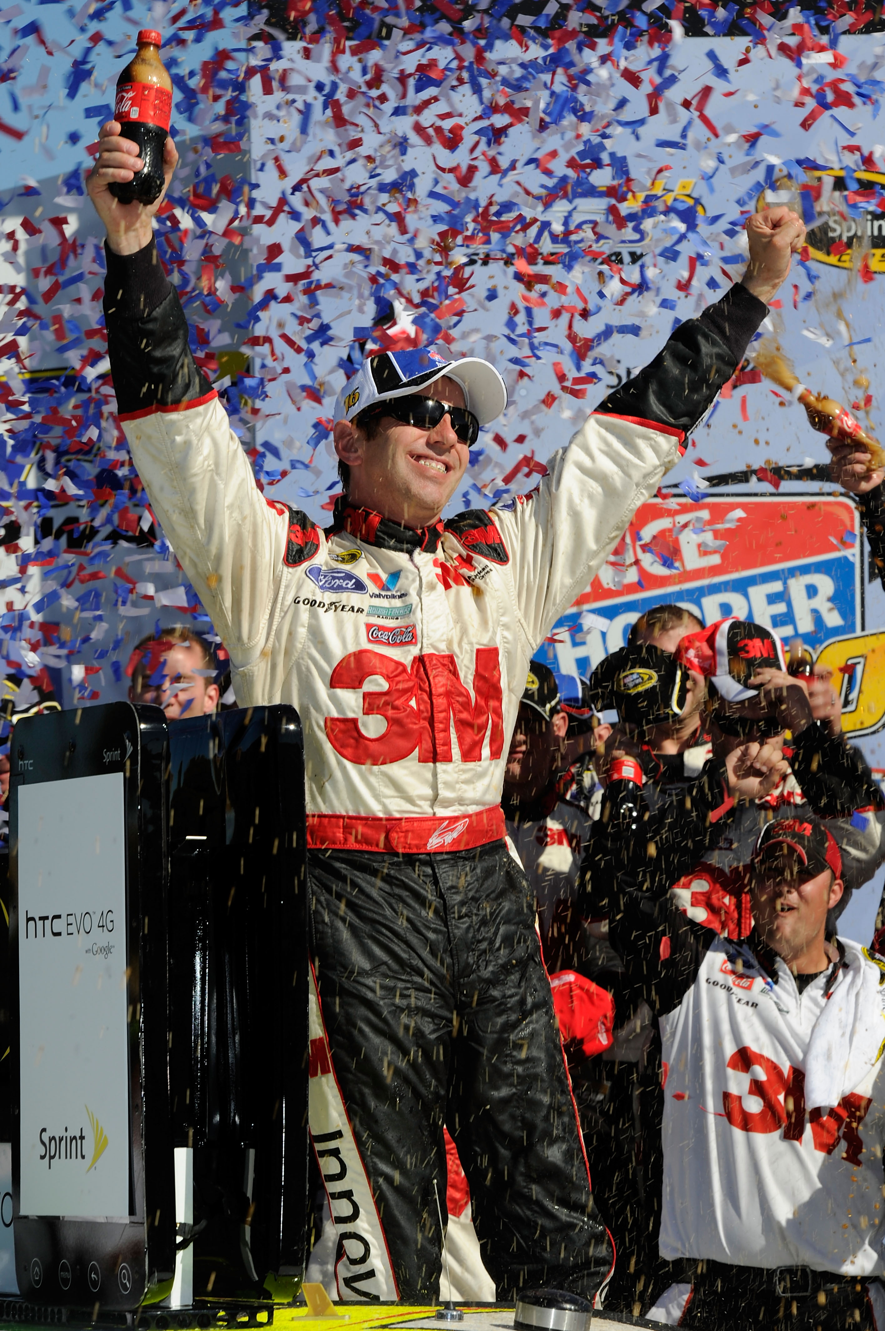 KANSAS CITY, KS - OCTOBER 03:  Greg Biffle, driver of the #16 3M Ford, celebrates in victory lane after winning the NASCAR Sprint Cup Series Price Chopper 400 on October 3, 2010 in Kansas City, Kansas.  (Photo by John Harrelson/Getty Images for NASCAR)