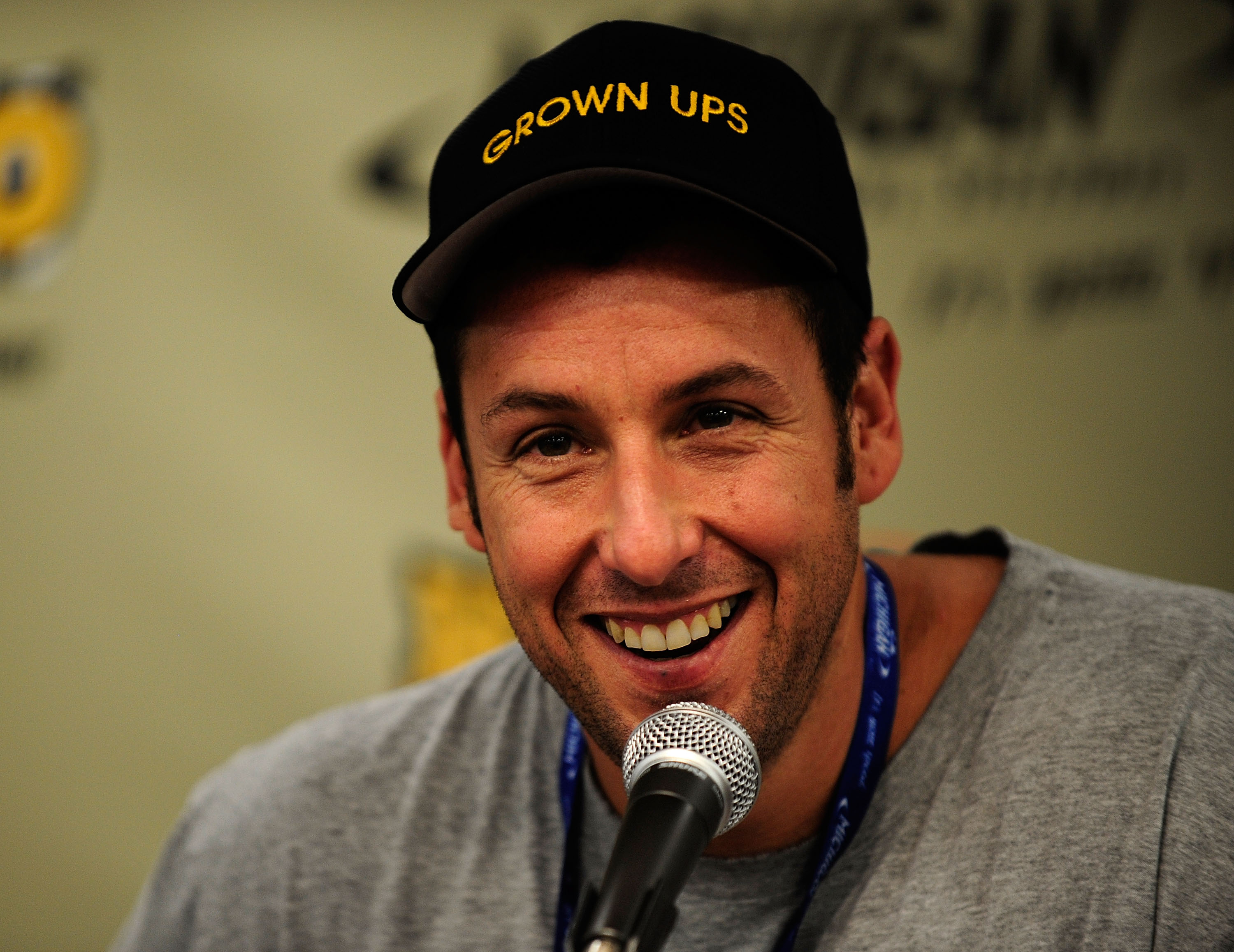 BROOKLYN, MI - JUNE 13:  (L-R) Actor Adam Sandler speaks to the media prior to the NASCAR Sprint Cup Series Heluva Good! Sour Cream Dips 400 at Michigan International Speedway on June 13, 2010 in Brooklyn, Michigan.  (Photo by Sam Greenwood/Getty Images)
