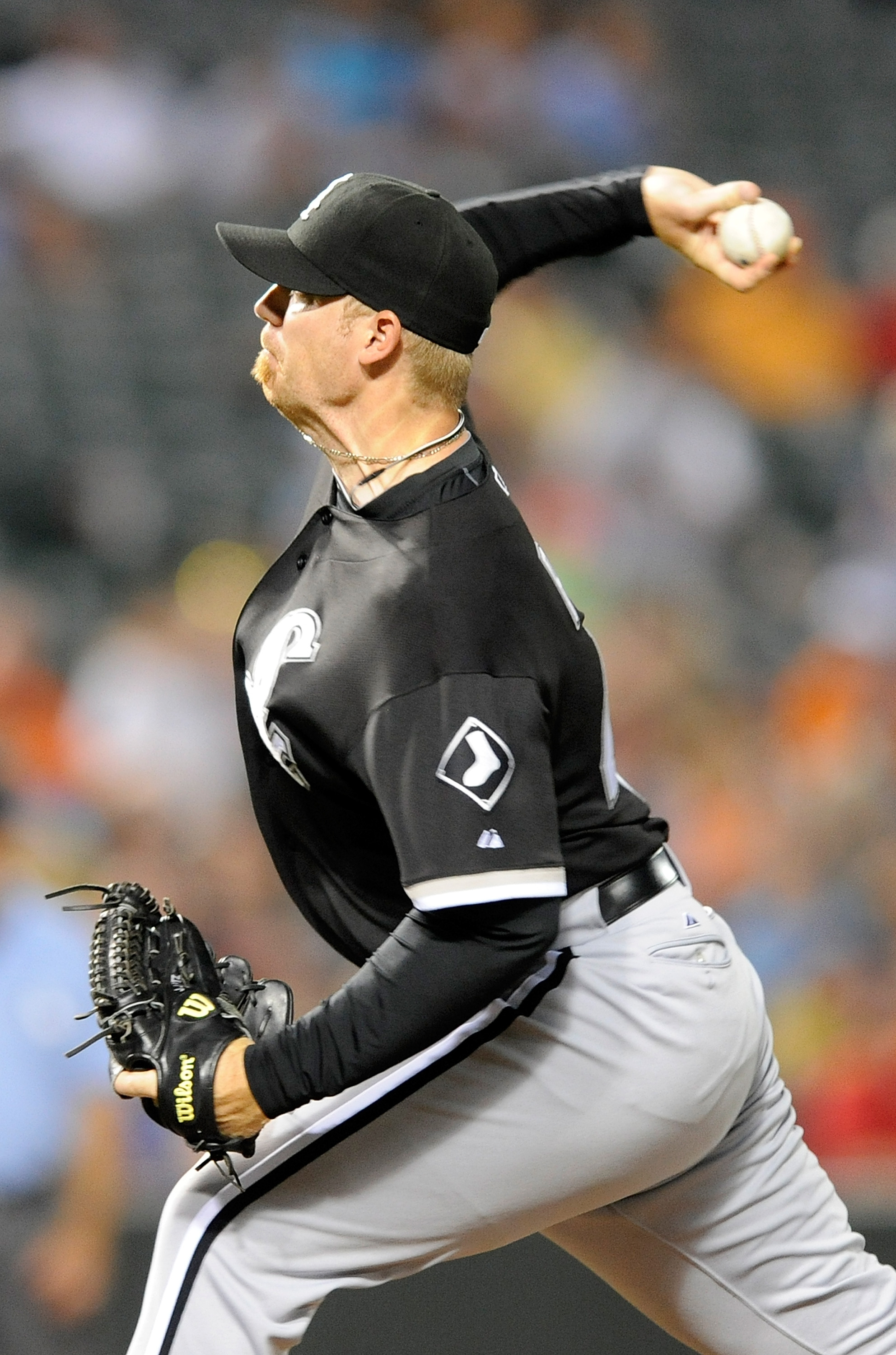 BALTIMORE - AUGUST 09:  J.J. Putz #40 of the Chicago White Sox pitches in the tenth inning against the Baltimore Orioles at Camden Yards on August 9, 2010 in Baltimore, Maryland.  (Photo by Greg Fiume/Getty Images)