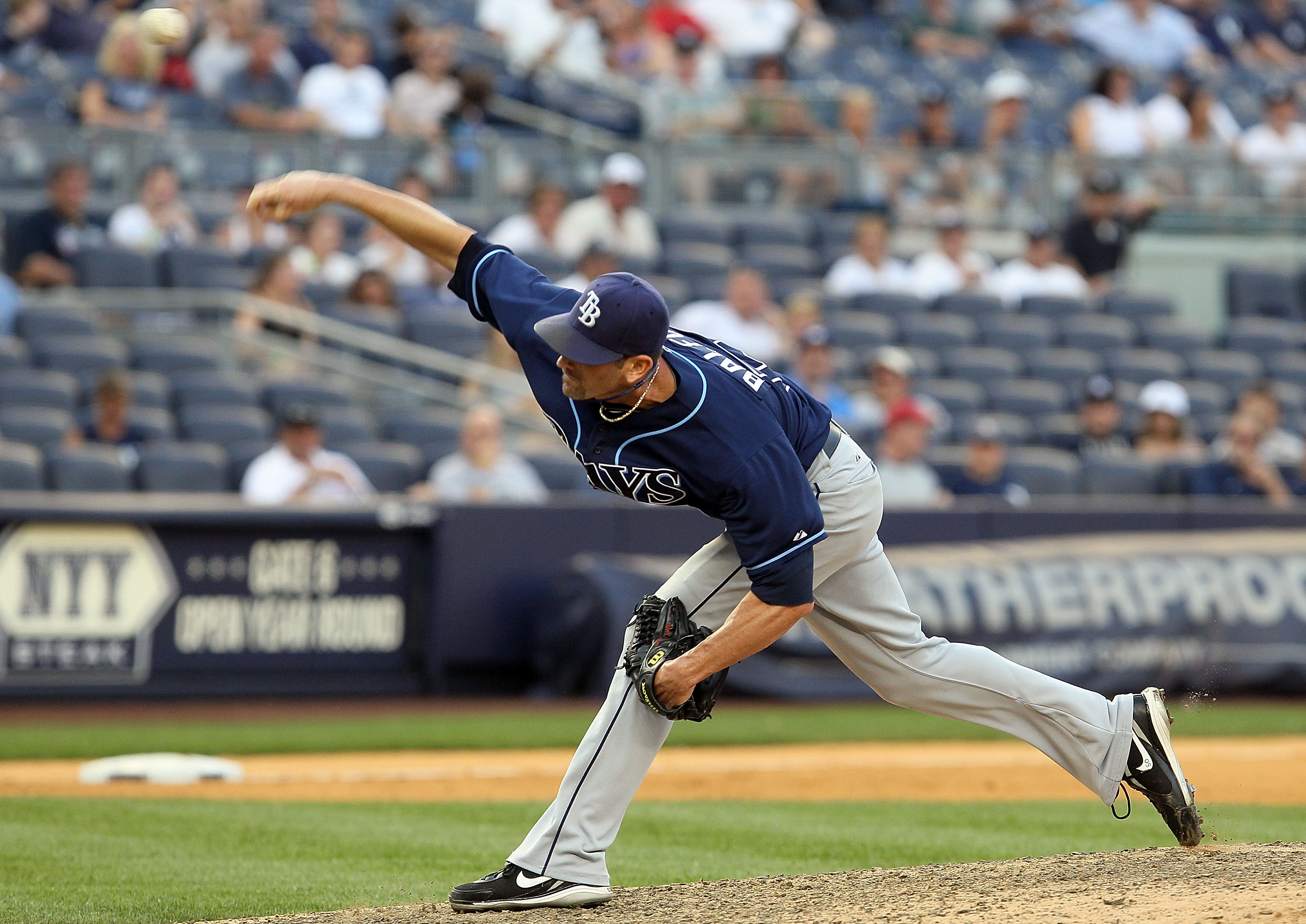 NEW YORK - JULY 17:  Grant Balfour #50 of the Tampa Bay Rays delivers a pitch against the New York Yankees on July 17, 2010 at Yankee Stadium in the Bronx borough of New York City. The Rays defeated the Yankees 10-5.  (Photo by Jim McIsaac/Getty Images)