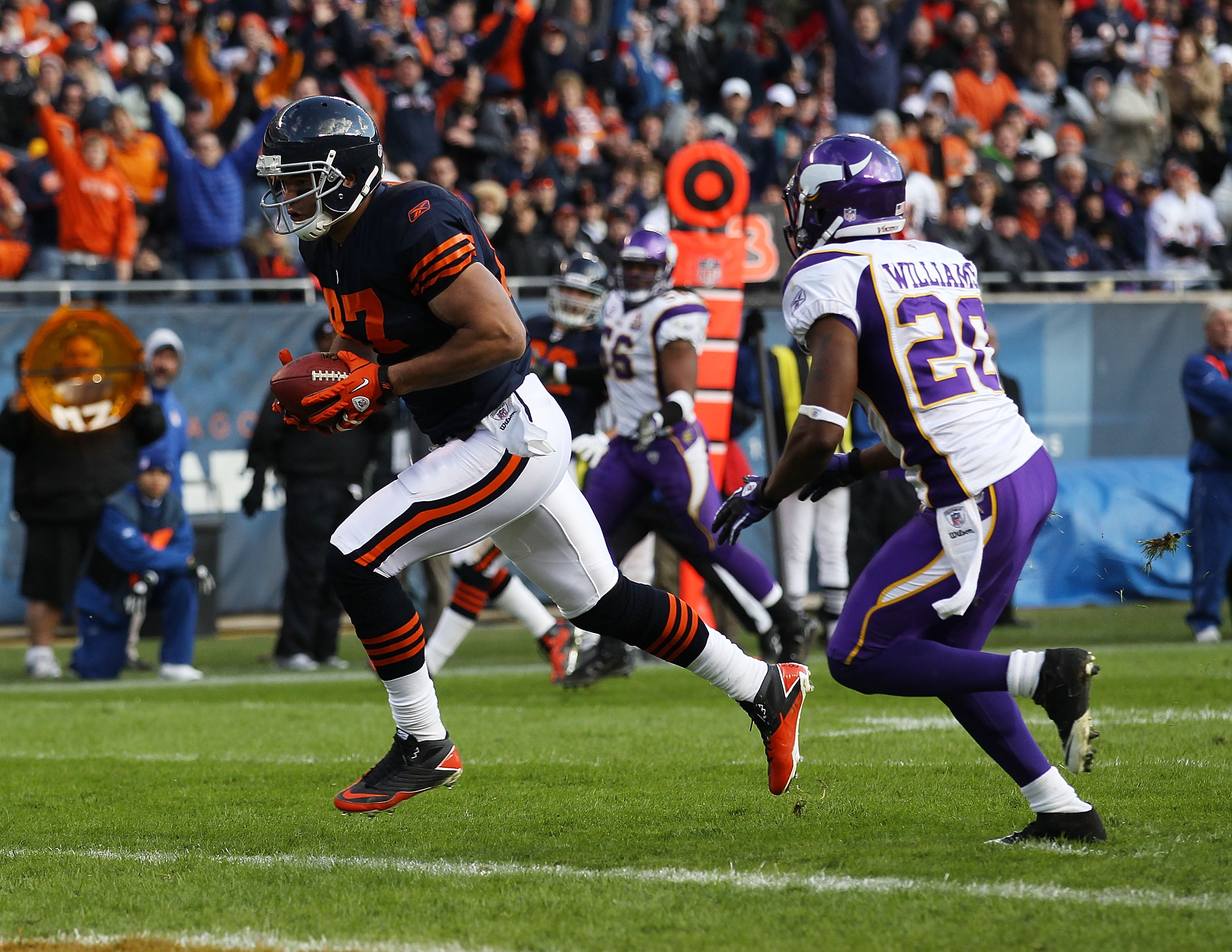 Chicago Bears tight end Kellen Davis (87) heads to the field for