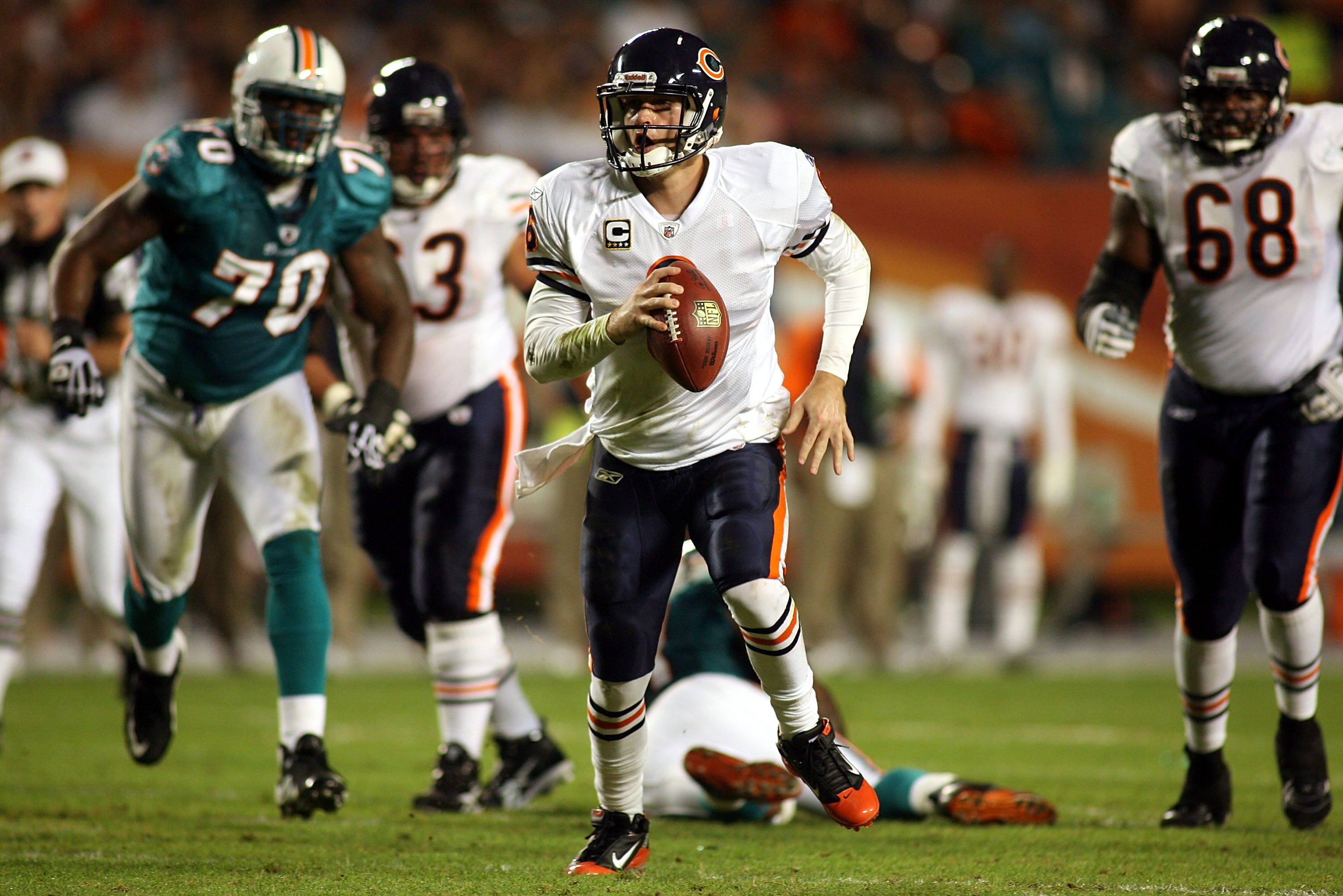 Chad Pennington of the Miami Dolphins looks for a receiver during the  News Photo - Getty Images