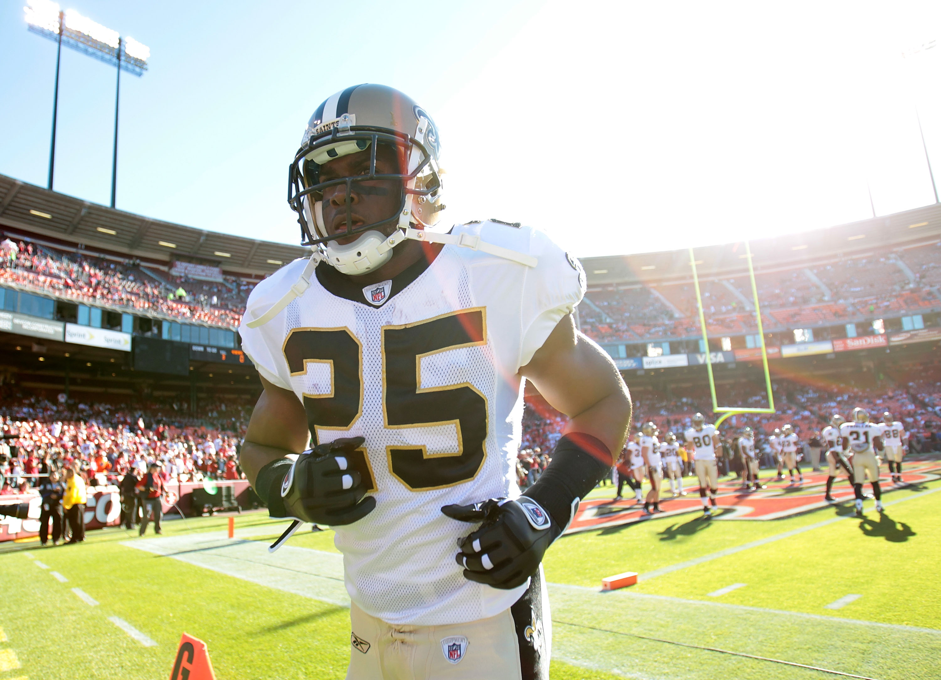 FILE - This Aug. 27, 2010, file photo shows New Orleans Saints player  Reggie Bush watching from the sidelines during the first quarter of their  preseason NFL football game at the Louisiana