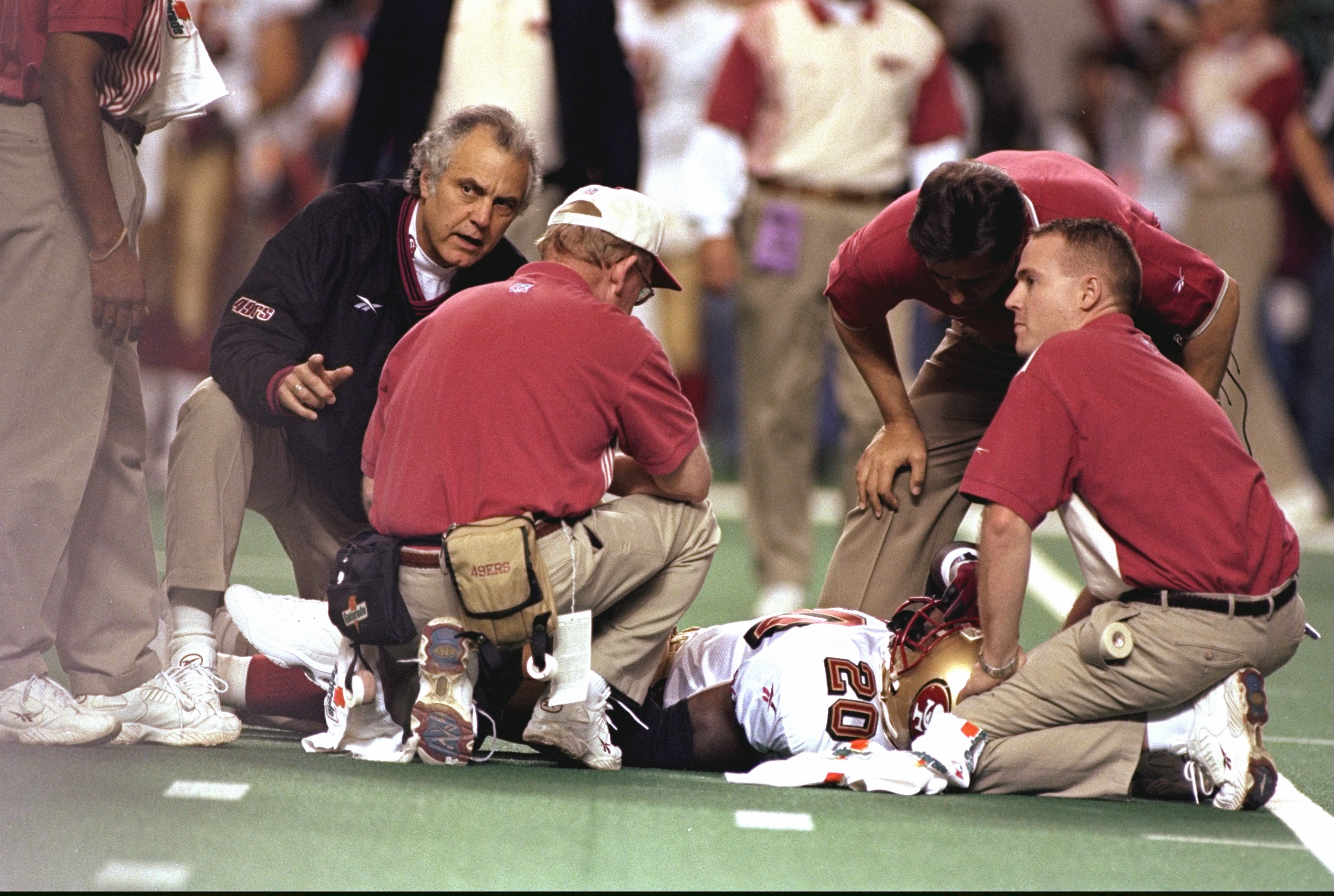 9 Jan 1999: Garrison Hearst #20 of the San Francisco 49ers lays on the field with a broken leg during the NFC Play Offs against the  Atlanta Falcons at the Georgia Dome in Atlanta, Georgia. The Falcons defeated the 49ers 20-16. Mandatory Credit: Craig Jon
