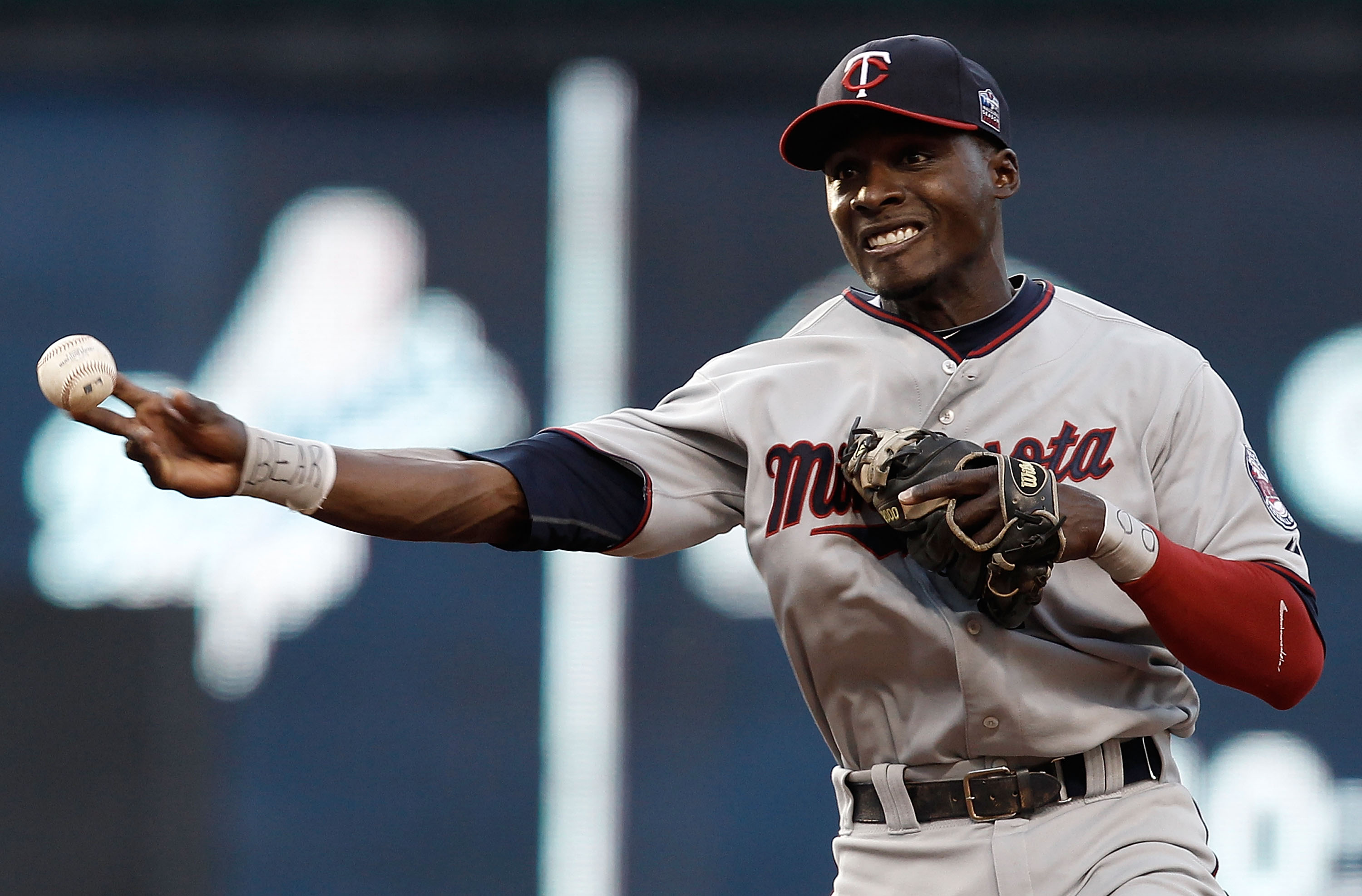 CLEVELAND, OH- APRIL 30: Orlando Hudson #1 of the Minnesota Twins throws to first base during the game against the Cleveland Indians on April 30, 2010 at Progressive Field in Cleveland, Ohio.  (Photo by Jared Wickerham/Getty Images)