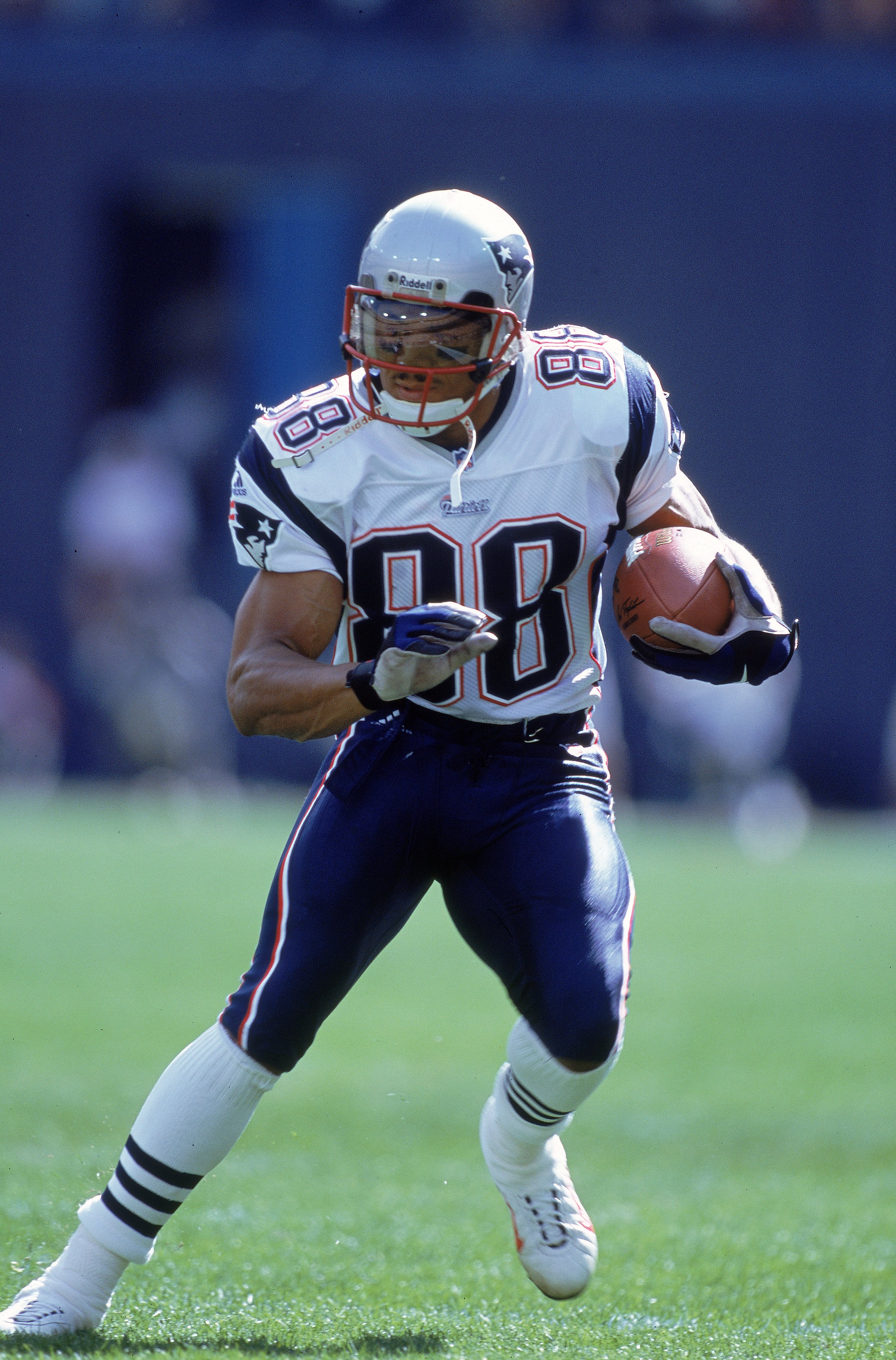 1 Oct 2000: Terry Glenn #88 of the New England Patriots scrambles with the ball during the game against the Denver Bronocs at the Mile High Stadium in Denver, Colorado. The Patriots defearted the Broncos 28-19.Mandatory Credit: Brian Bahr  /Allsport