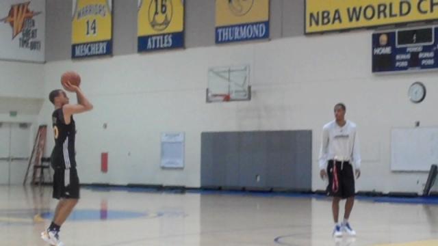 Stephen Curry shooting jumpers.
