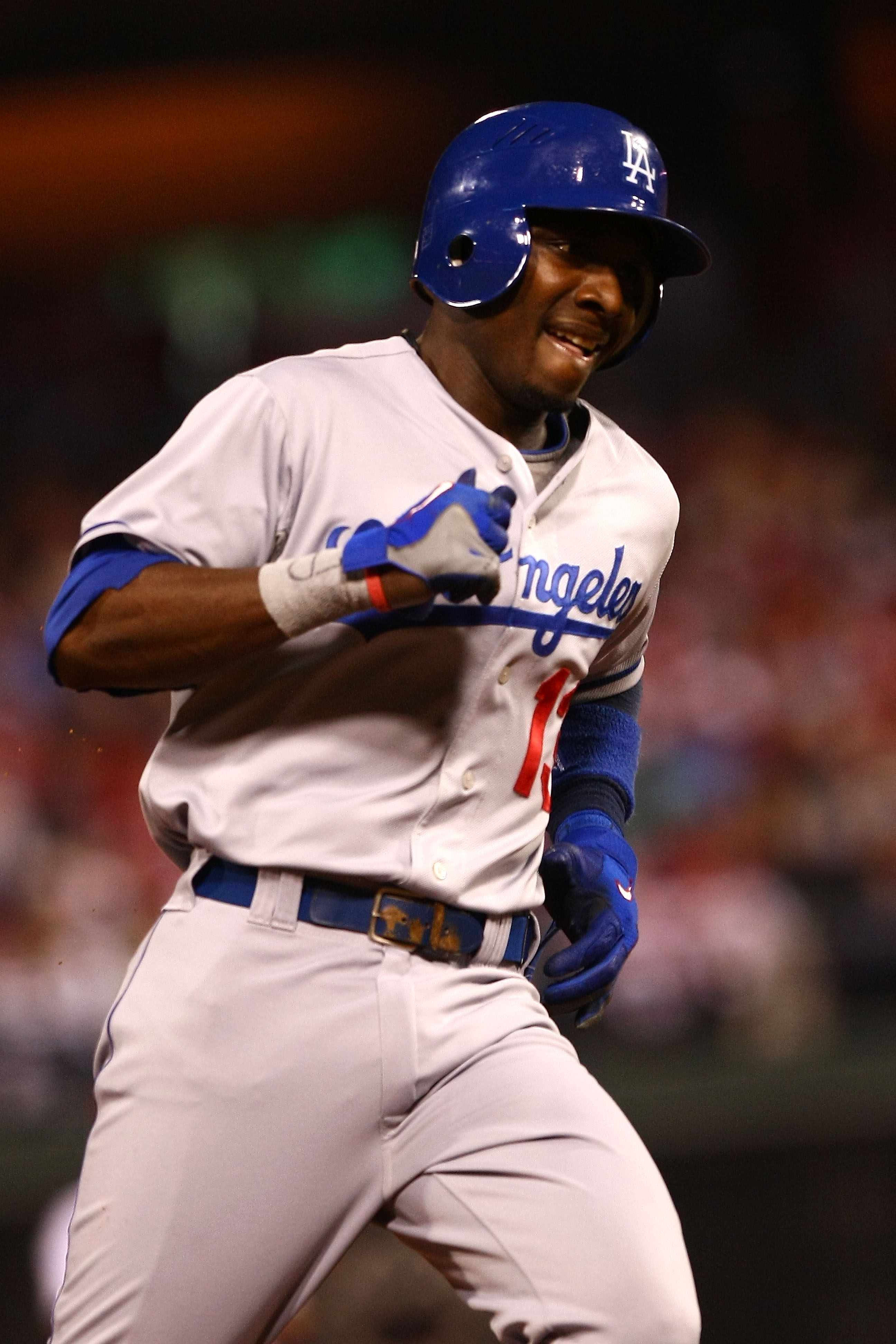 PHILADELPHIA - OCTOBER 21:  Orlando Hudson #13 of the Los Angeles Dodgers rounds the bases after hitting a home run in the fifth inning against the Philadelphia Phillies in Game Five of the NLCS during the 2009 MLB Playoffs at Citizens Bank Park on Octobe