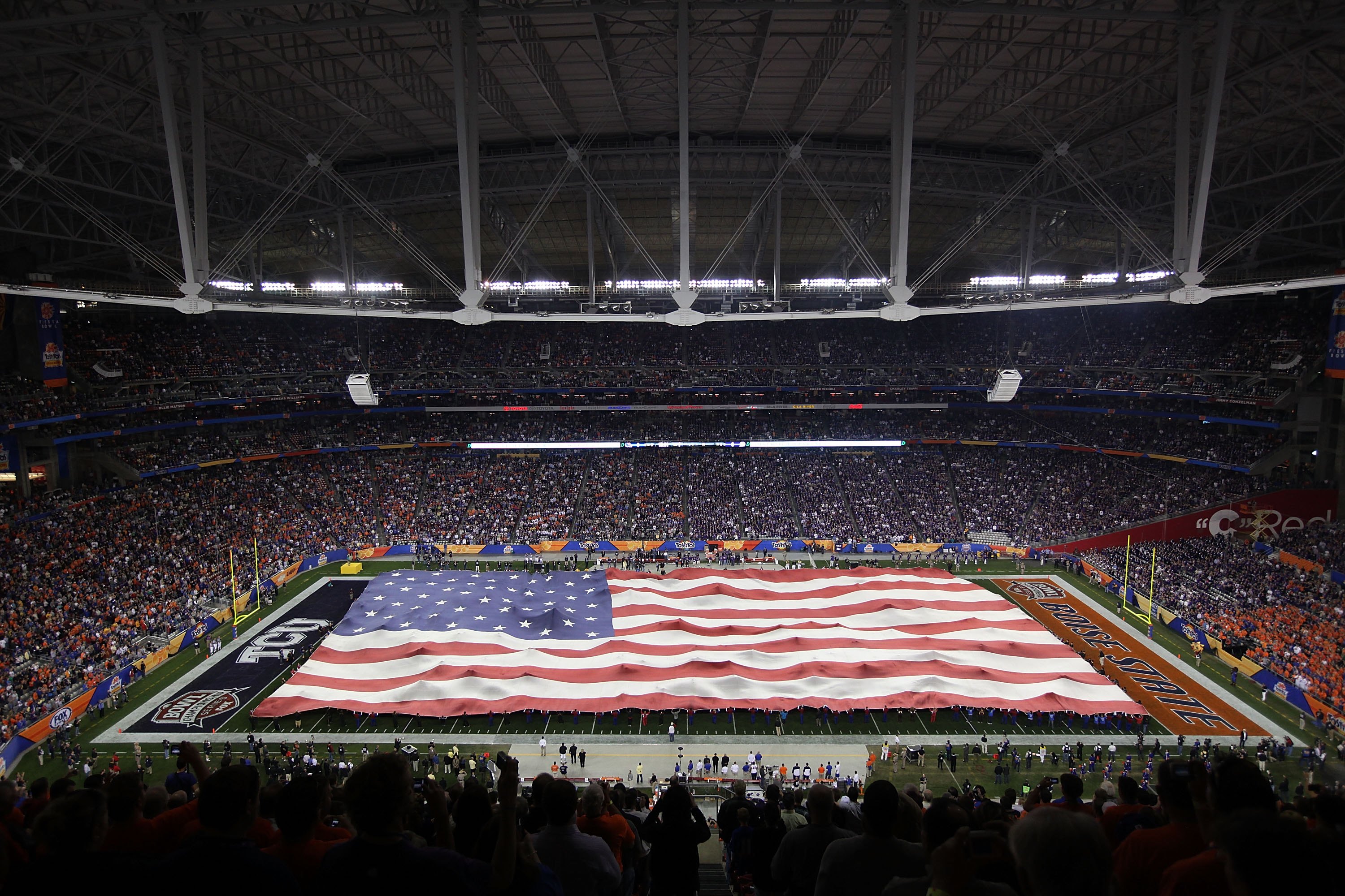 GLENDALE, AZ - JANUARY 04:  A general view of the American flag on the field during the national anthem before the Tostitos Fiesta Bowl between the Boise State Broncos and the TCU Horned Frogs at the Universtity of Phoenix Stadium on January 4, 2010 in Gl