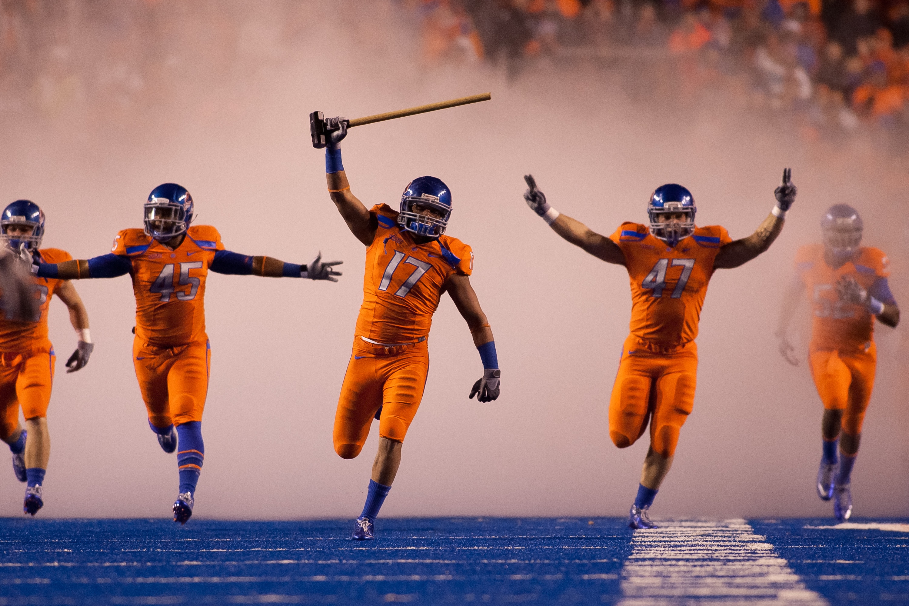 BOISE, ID - NOVEMBER 19: Winston Venable #17 leads the Boise State Broncos onto the field before their game against the Fresno State Bulldogs at Bronco Stadium on November 19, 2010 in Boise, Idaho. (Photo by Otto Kitsinger III/Getty Images)