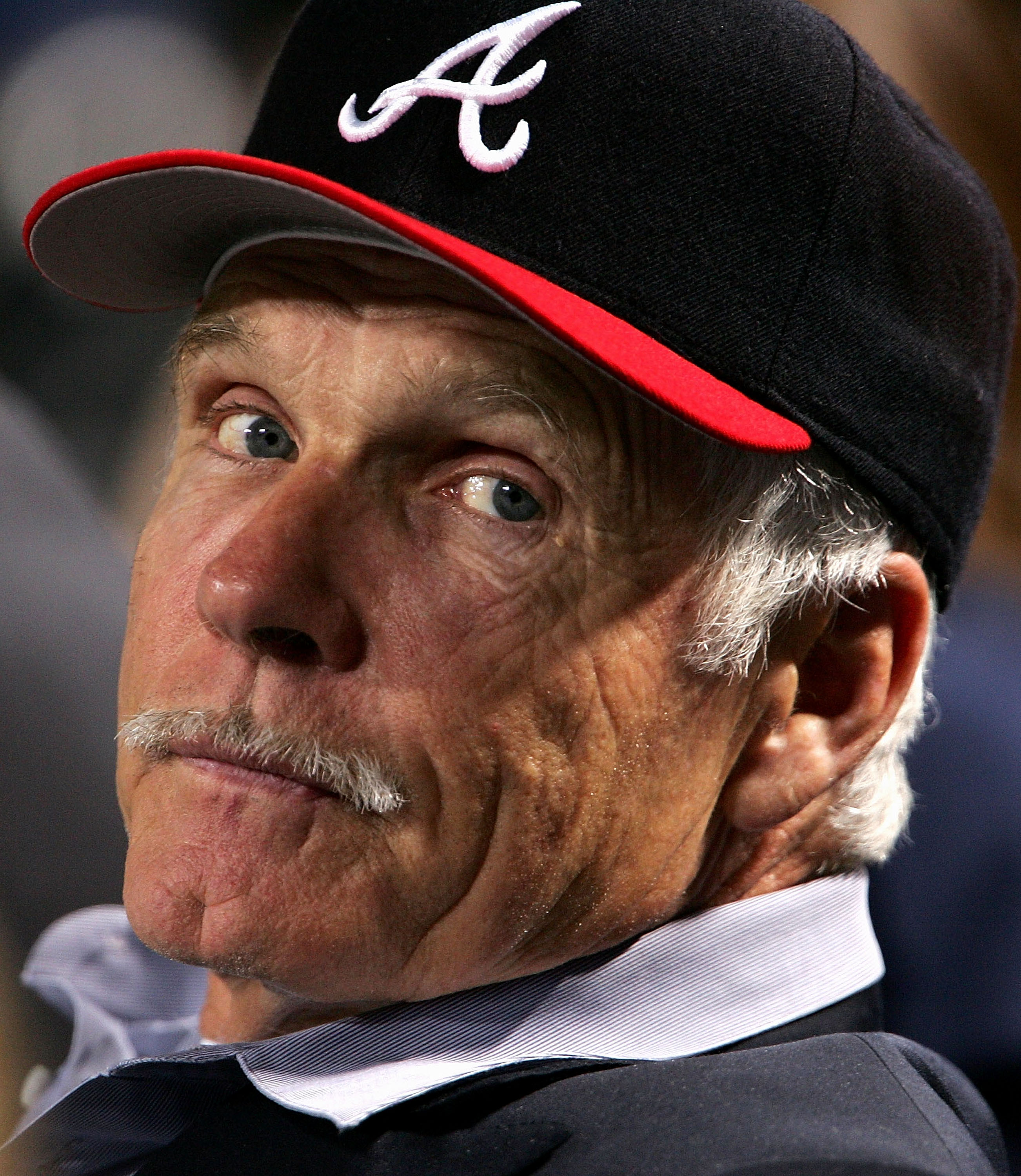 ATLANTA - OCTOBER 11:  Ted Turner, former owner of the Atlanta Braves, watches game five of the National League Division Series against the Houston Rockets on October 11, 2004 at Turner Field in Atlanta, Georgia.  (Photo by Doug Pensinger/Getty Images)