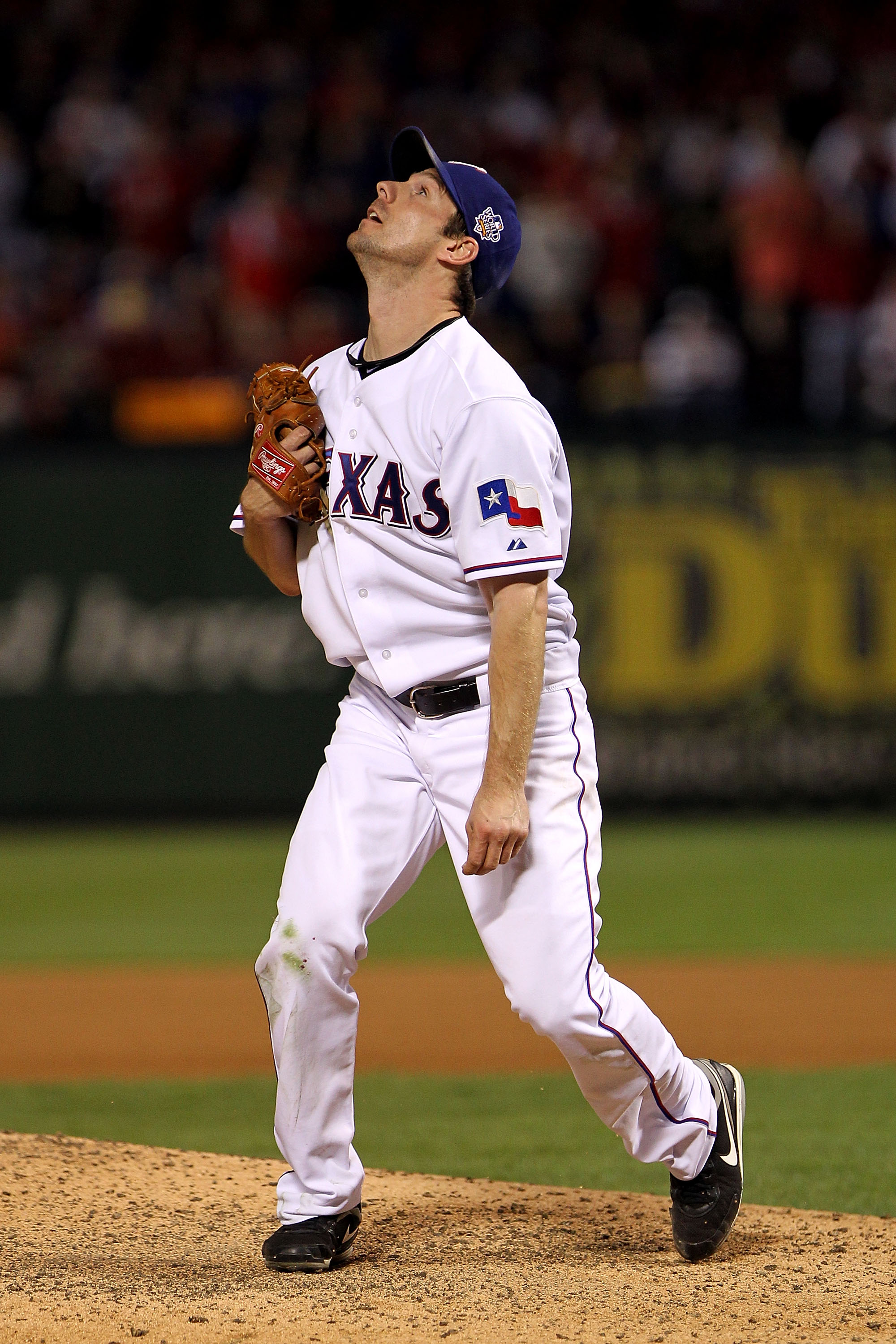 ARLINGTON, TX - NOVEMBER 01:  Cliff Lee #33 of the Texas Rangers watches a 3-run home run hit by Edgar Renteria #16 of the San Francisco Giants leave the ballpark in Game Five of the 2010 MLB World Series at Rangers Ballpark in Arlington on November 1, 20