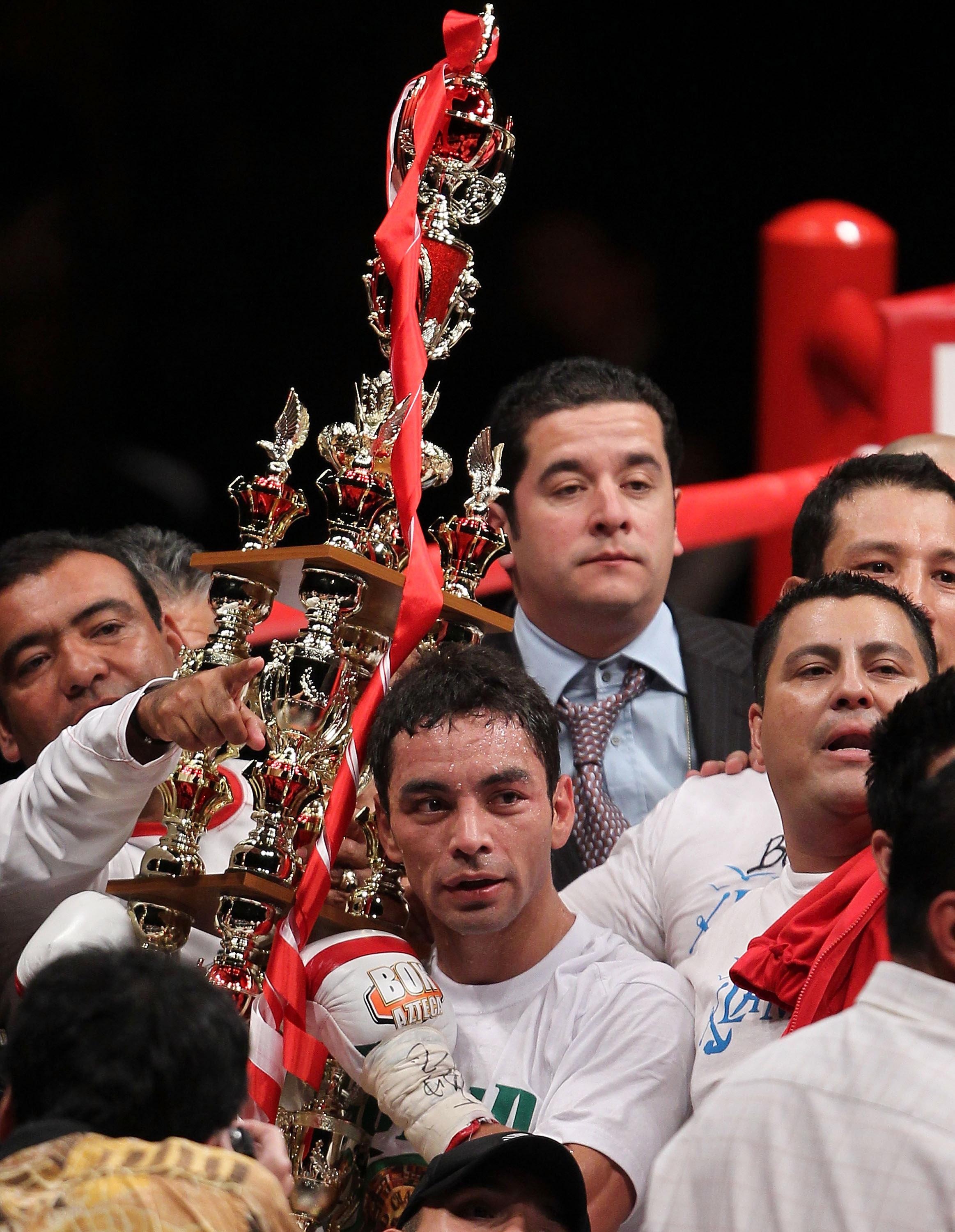 TOKYO - APRIL 30: Fernando Montiel of Mexico celebrates after winning against Hozumi Hasegawa of Japan during the WBC Bantamweight Title Fight between Hozumi Hasegawa and Fernando Montiel at Nippon Budokan on April 30, 2010 in Tokyo, Japan. (Photo by Ko