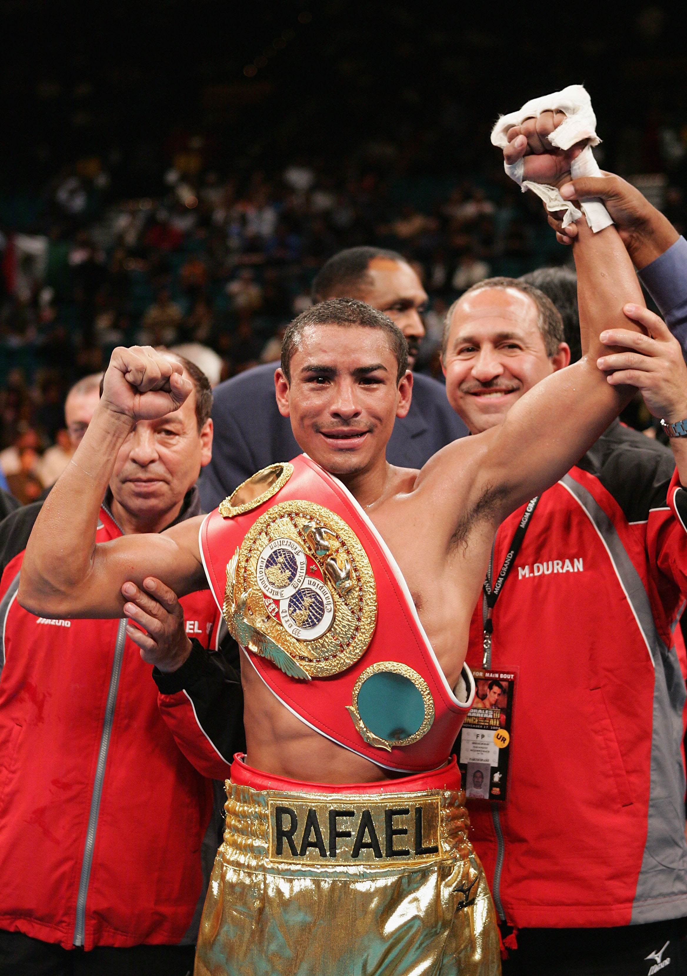 LAS VEGAS - NOVEMBER 27: Rafael Marquez celebrates after defeating Mauricio Pastrana for the IBF World Bantamweight Championship at the MGM Grand Garden Arena on November 27, 2004 in Las Vegas, Nevada. Marquez defeated Pastrana by TKO after the 8th round